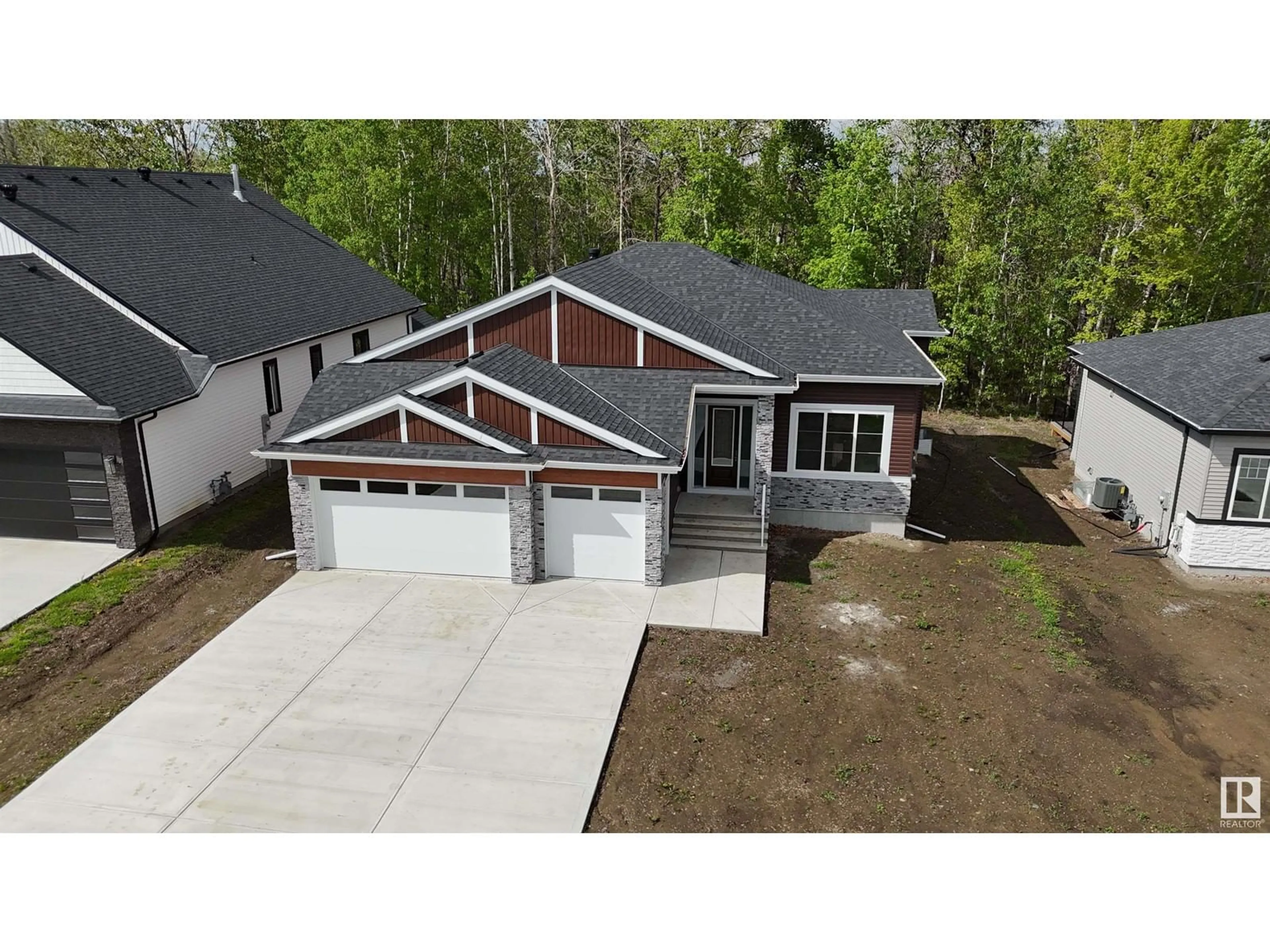 A pic from outside/outdoor area/front of a property/back of a property/a pic from drone, street for 504 RR 73, Rural Brazeau County Alberta T7A0B9
