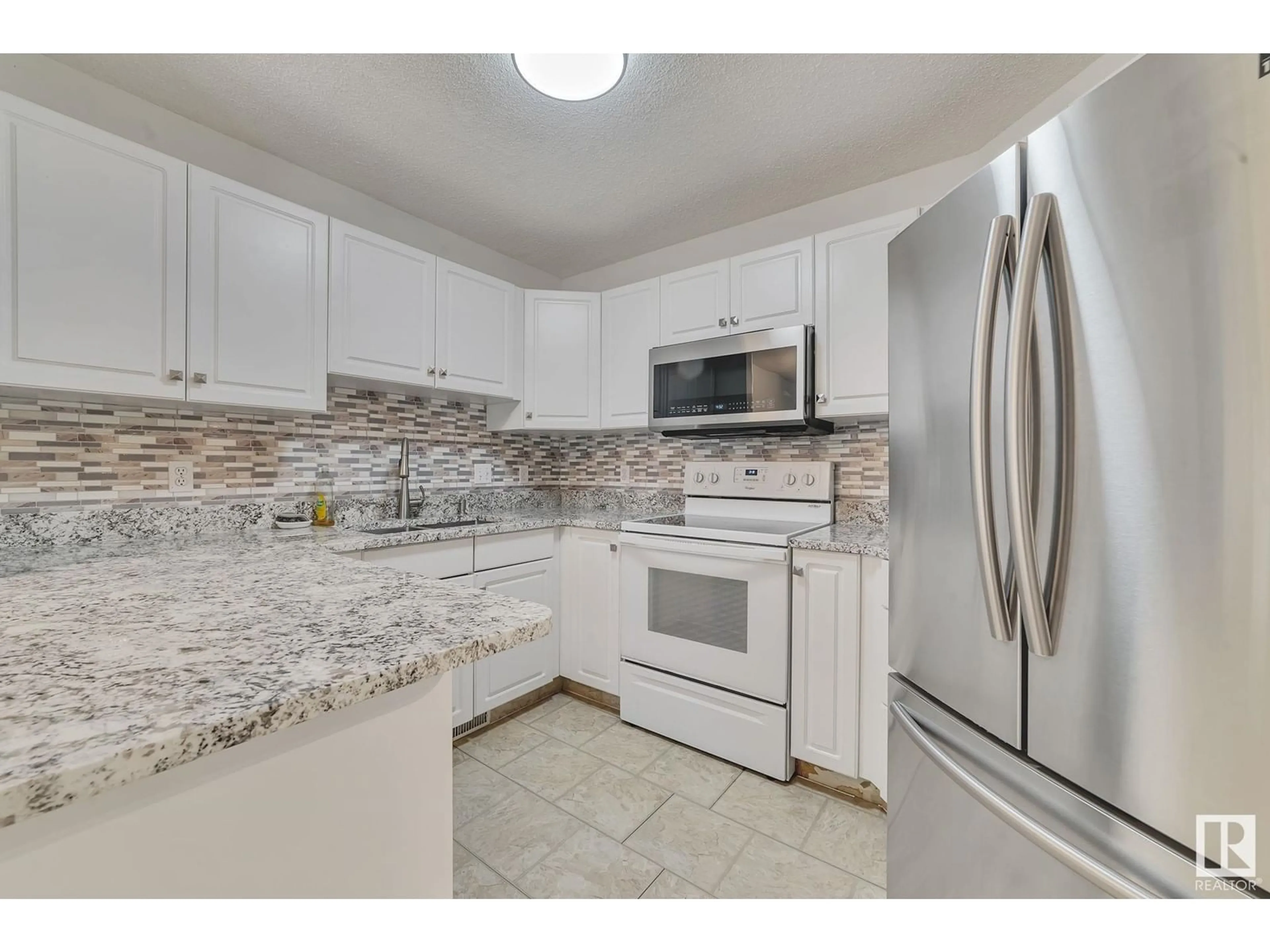 Standard kitchen, ceramic/tile floor for 3450 43 AV, Edmonton Alberta T6L6W9