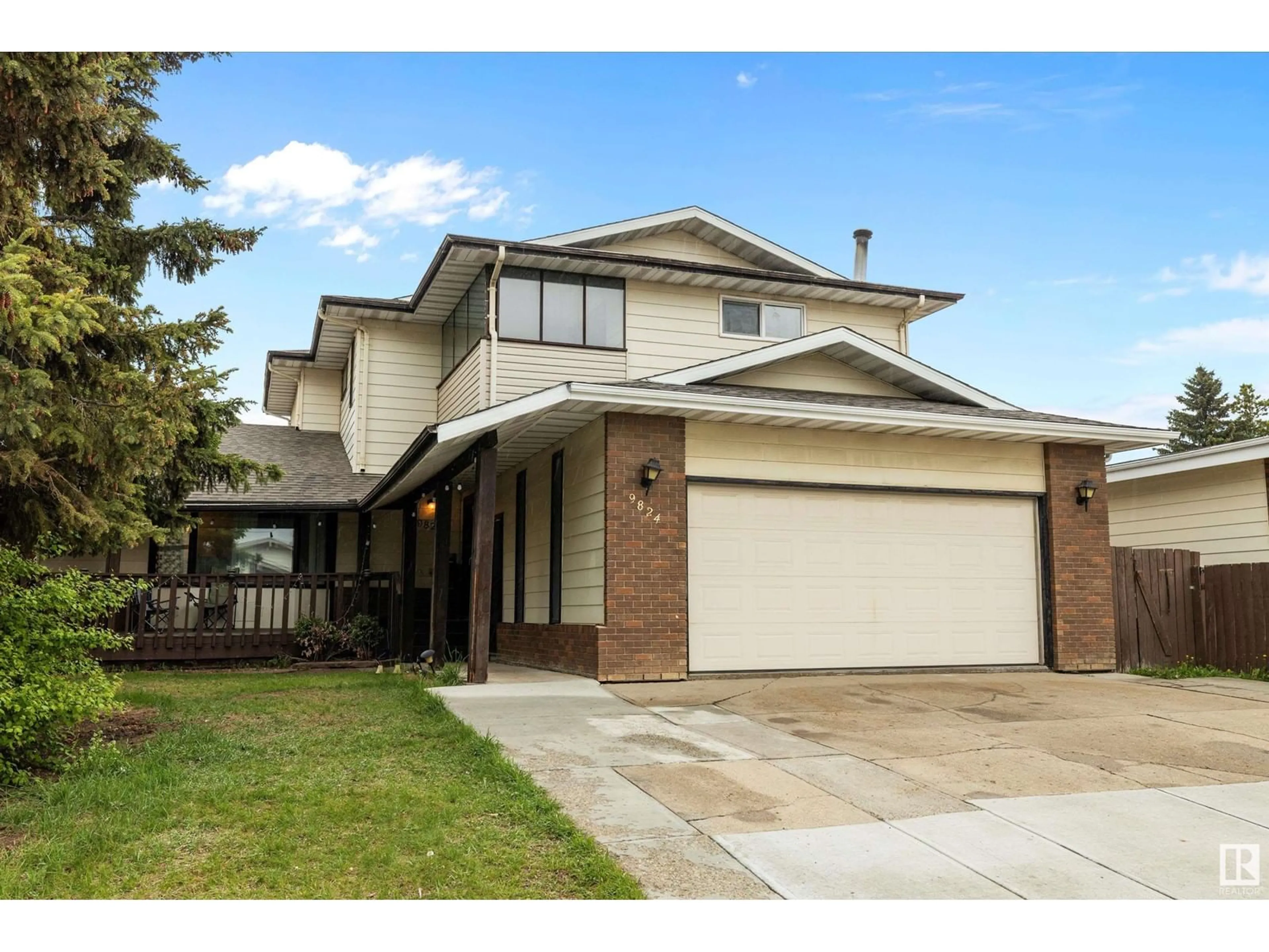 Home with vinyl exterior material, street for NW - 9824 157 AV, Edmonton Alberta T5X4G9