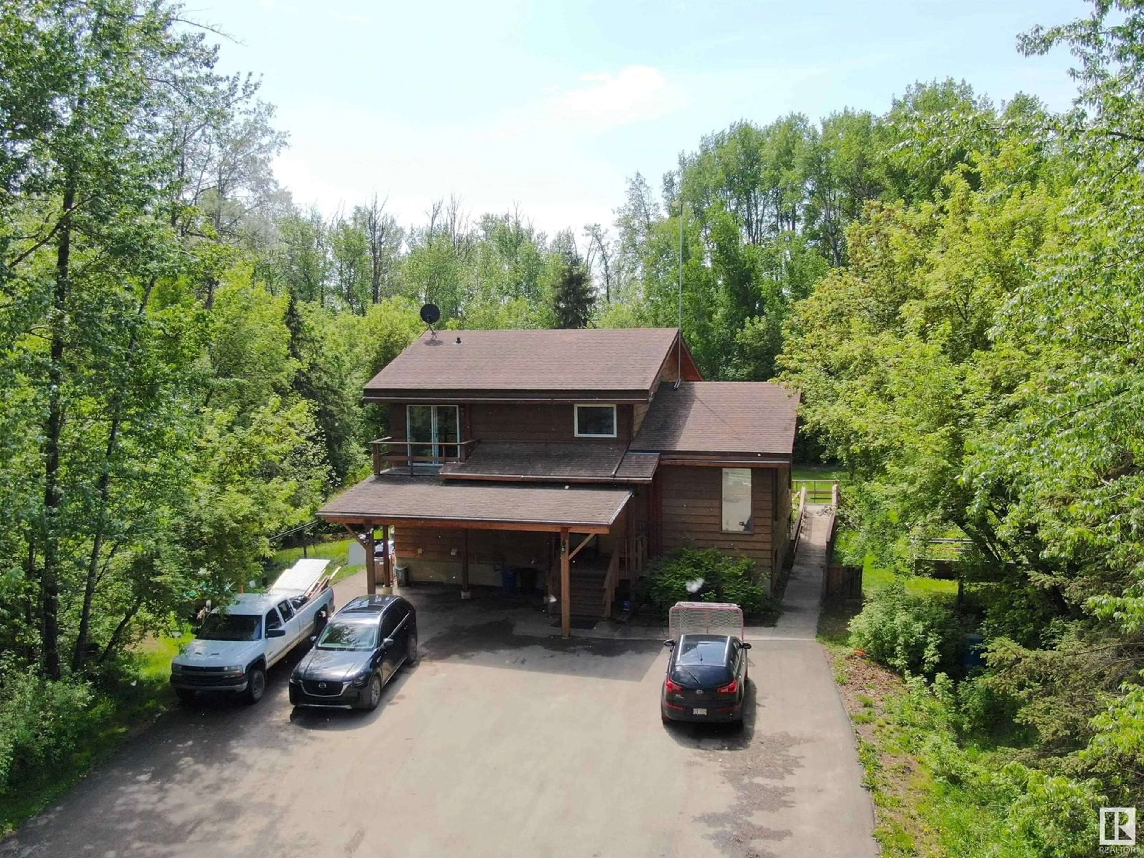 A pic from outside/outdoor area/front of a property/back of a property/a pic from drone, unknown for 7 - 52215 RGE ROAD 270, Rural Parkland County Alberta T7X3L6