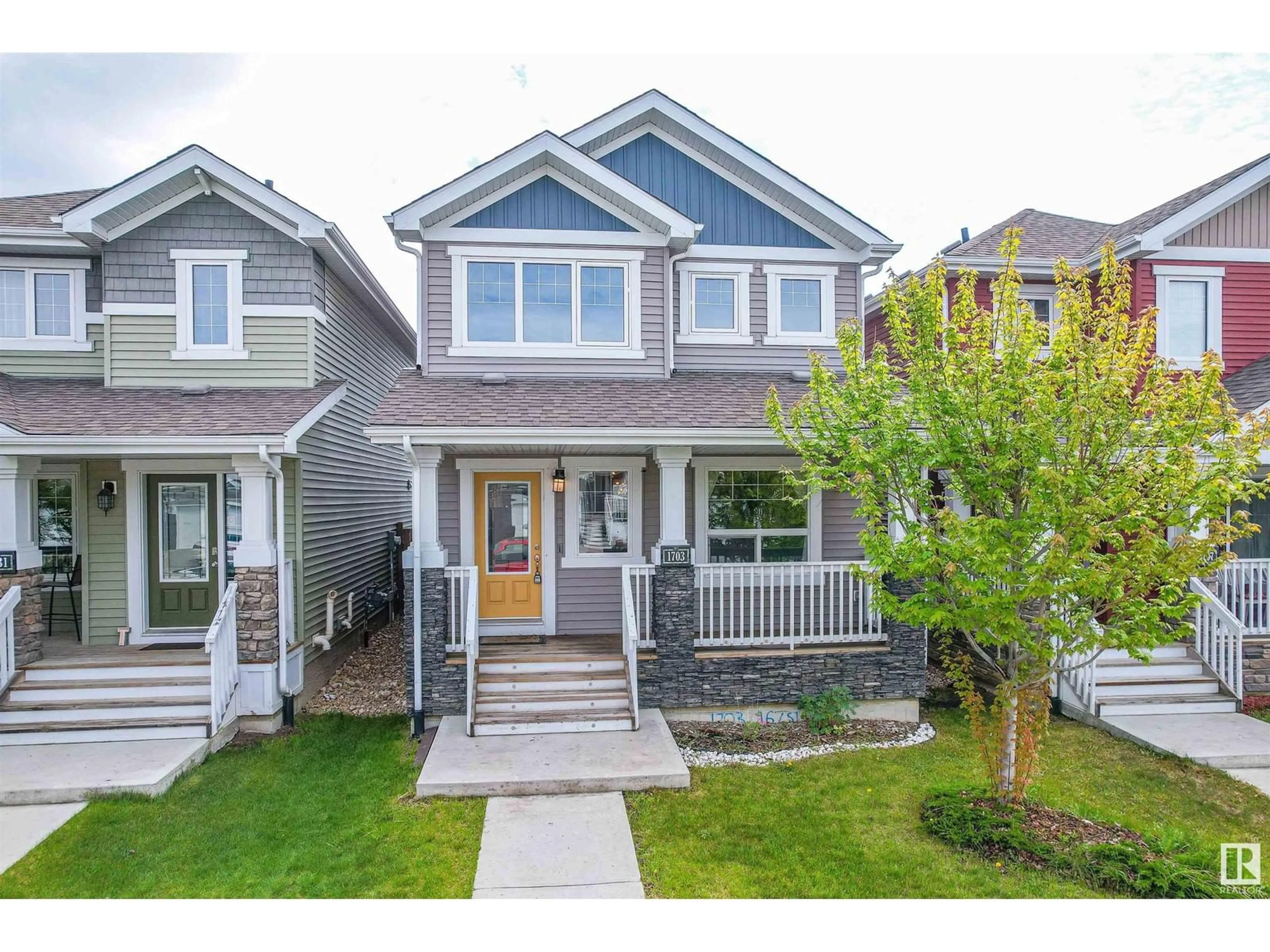 Home with vinyl exterior material, street for SW - 1703 167 ST, Edmonton Alberta T6W3C5