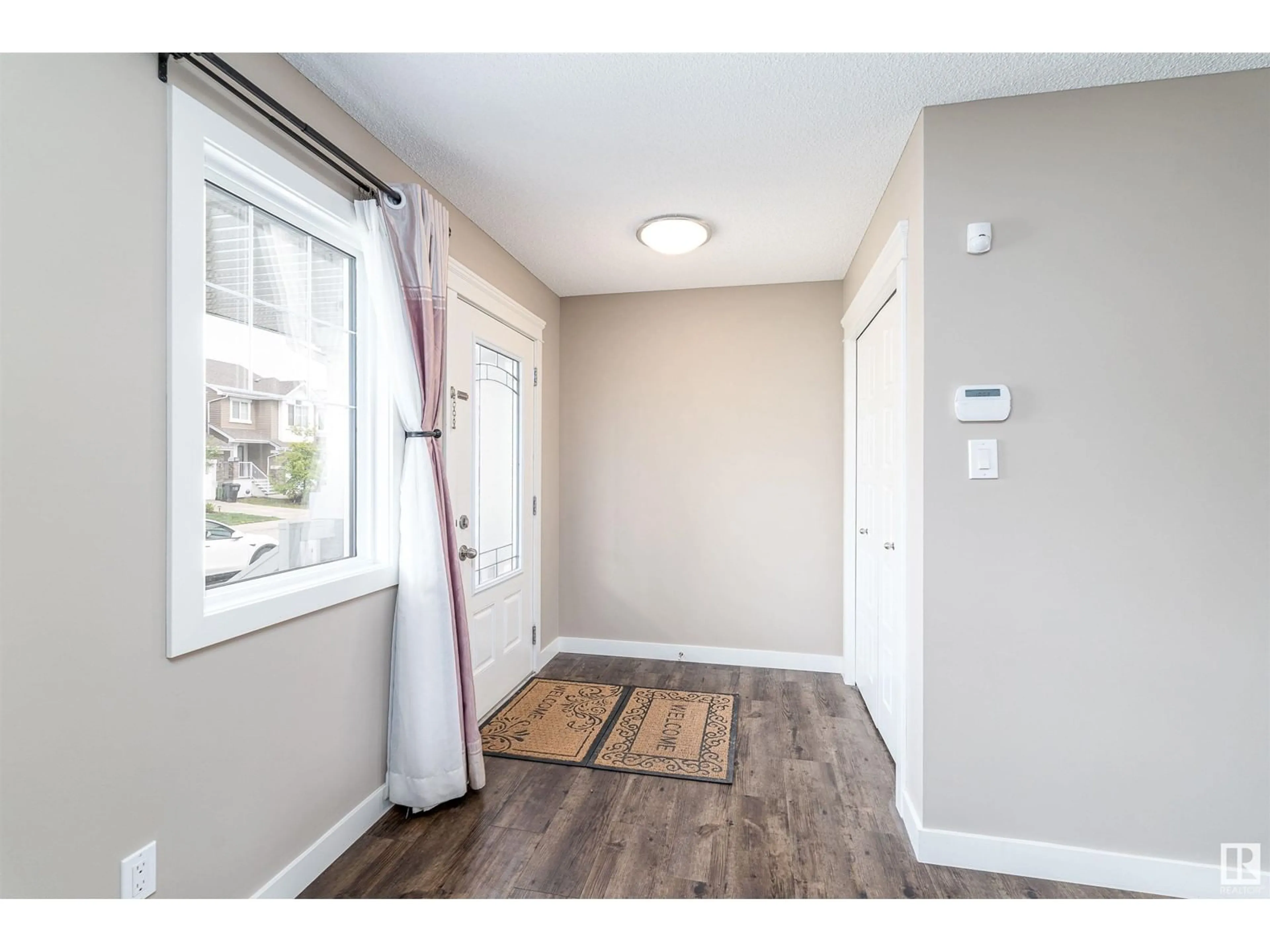 Indoor entryway for SW - 1703 167 ST, Edmonton Alberta T6W3C5