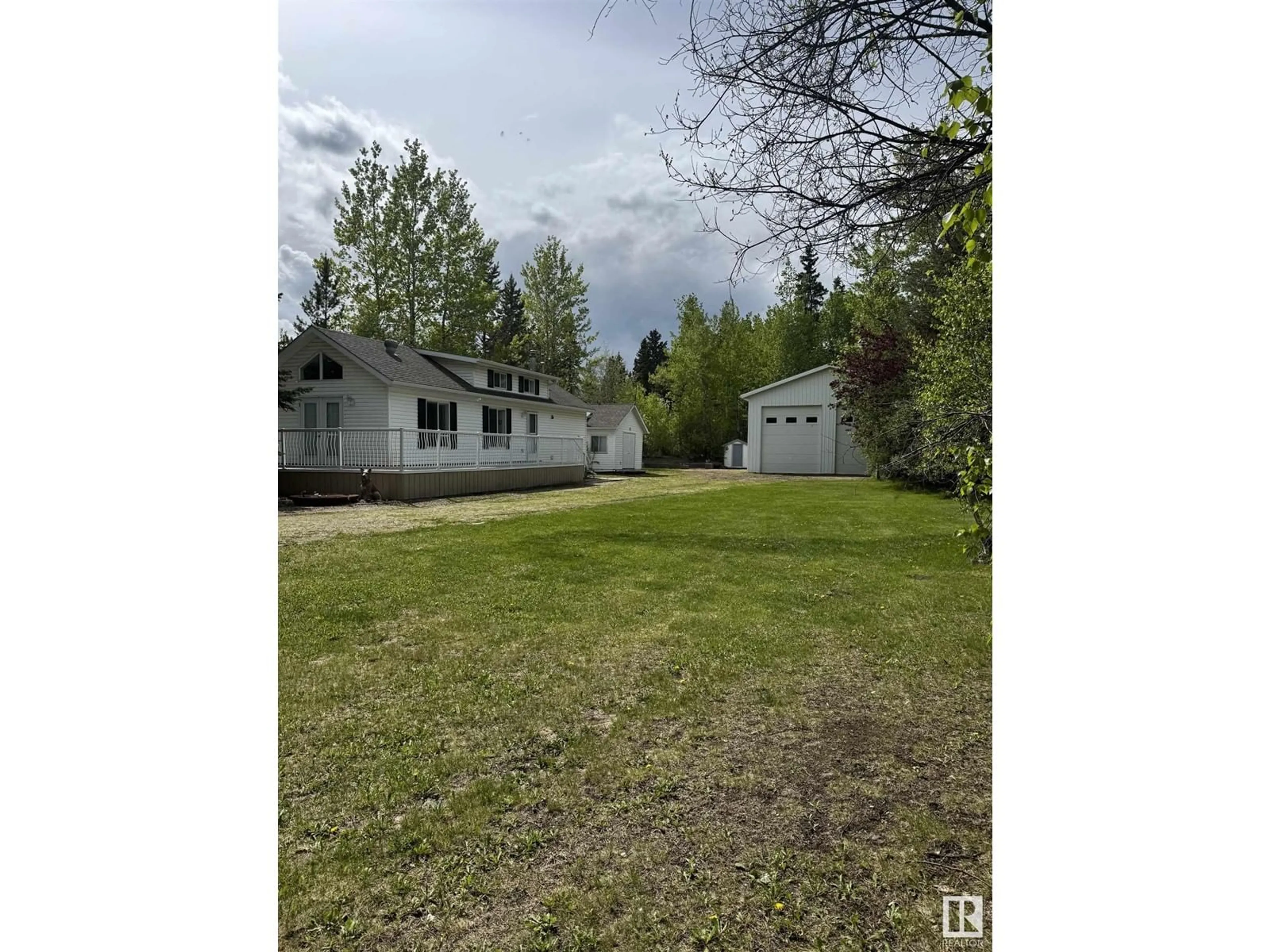 A pic from outside/outdoor area/front of a property/back of a property/a pic from drone, forest/trees view for #121 - 4418 HWY 633, Rural Lac Ste. Anne County Alberta T0E0L0