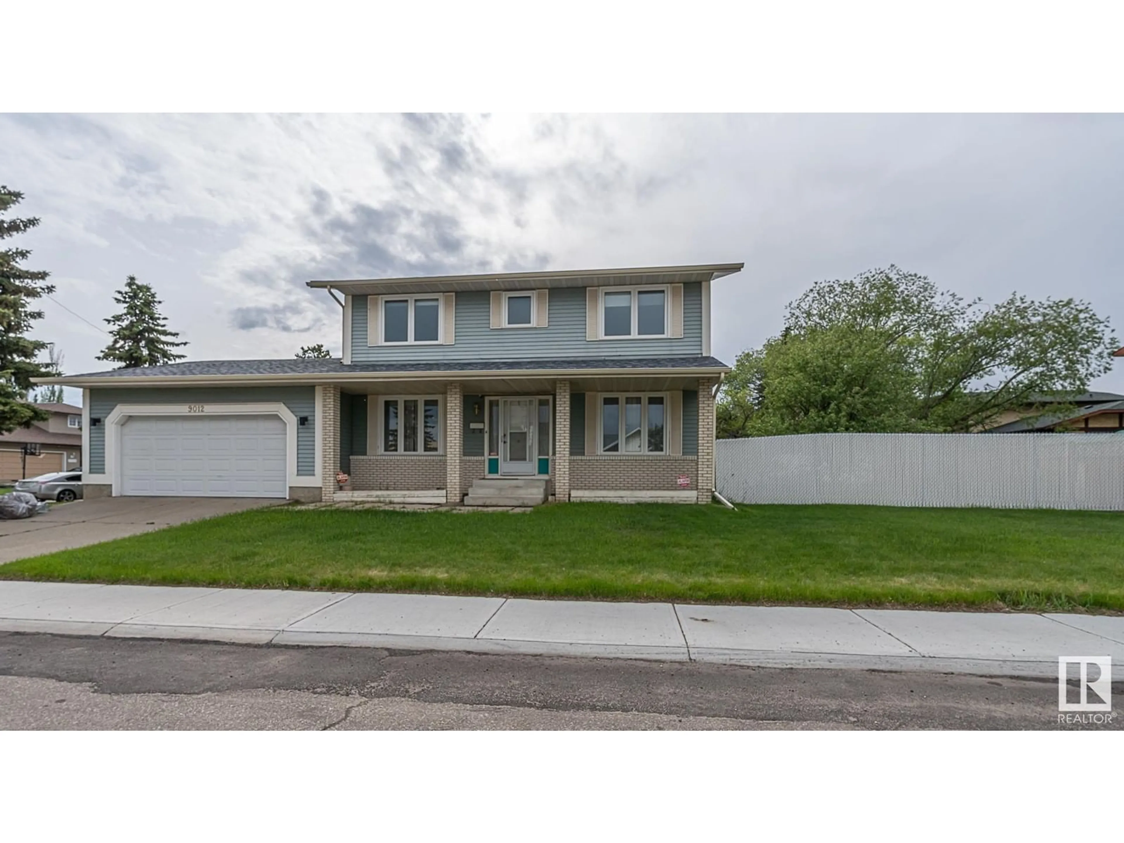 Home with vinyl exterior material, street for NW - 9012 177 ST, Edmonton Alberta T5T3L2