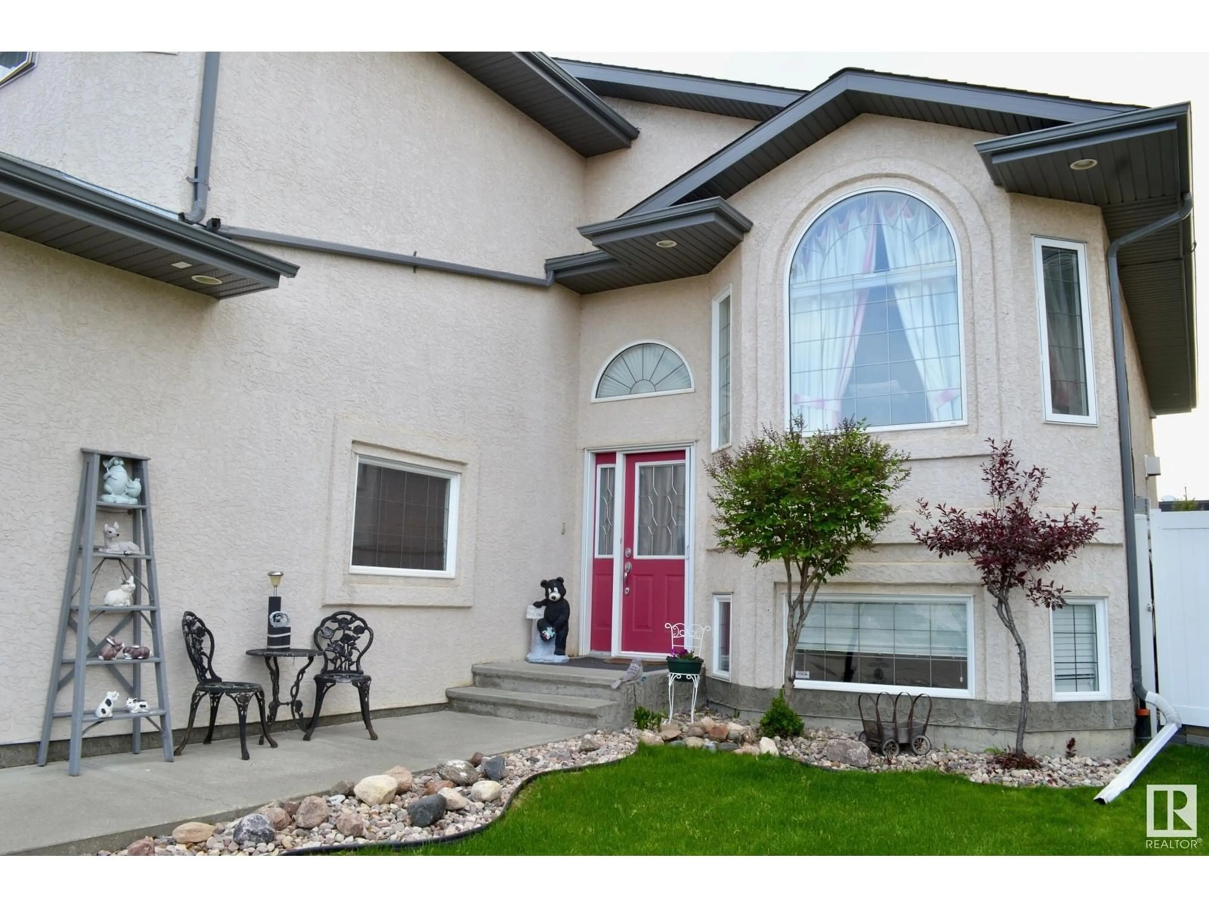 Home with vinyl exterior material, street for 16832 79 ST, Edmonton Alberta T5Z3Y9