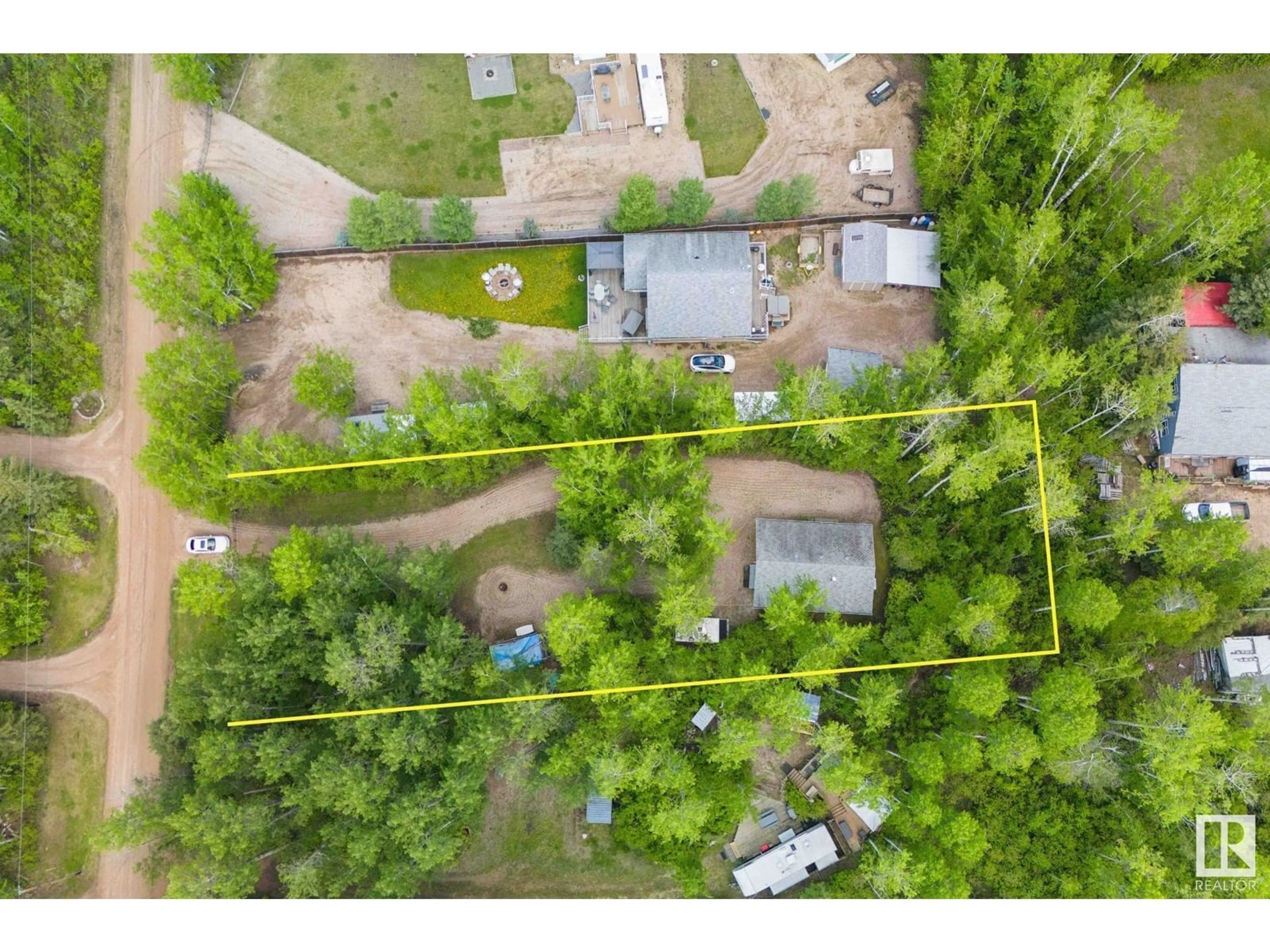 A pic from outside/outdoor area/front of a property/back of a property/a pic from drone, forest/trees view for 37 SUMMERLEA DR, Rural Barrhead County Alberta T0G2G0