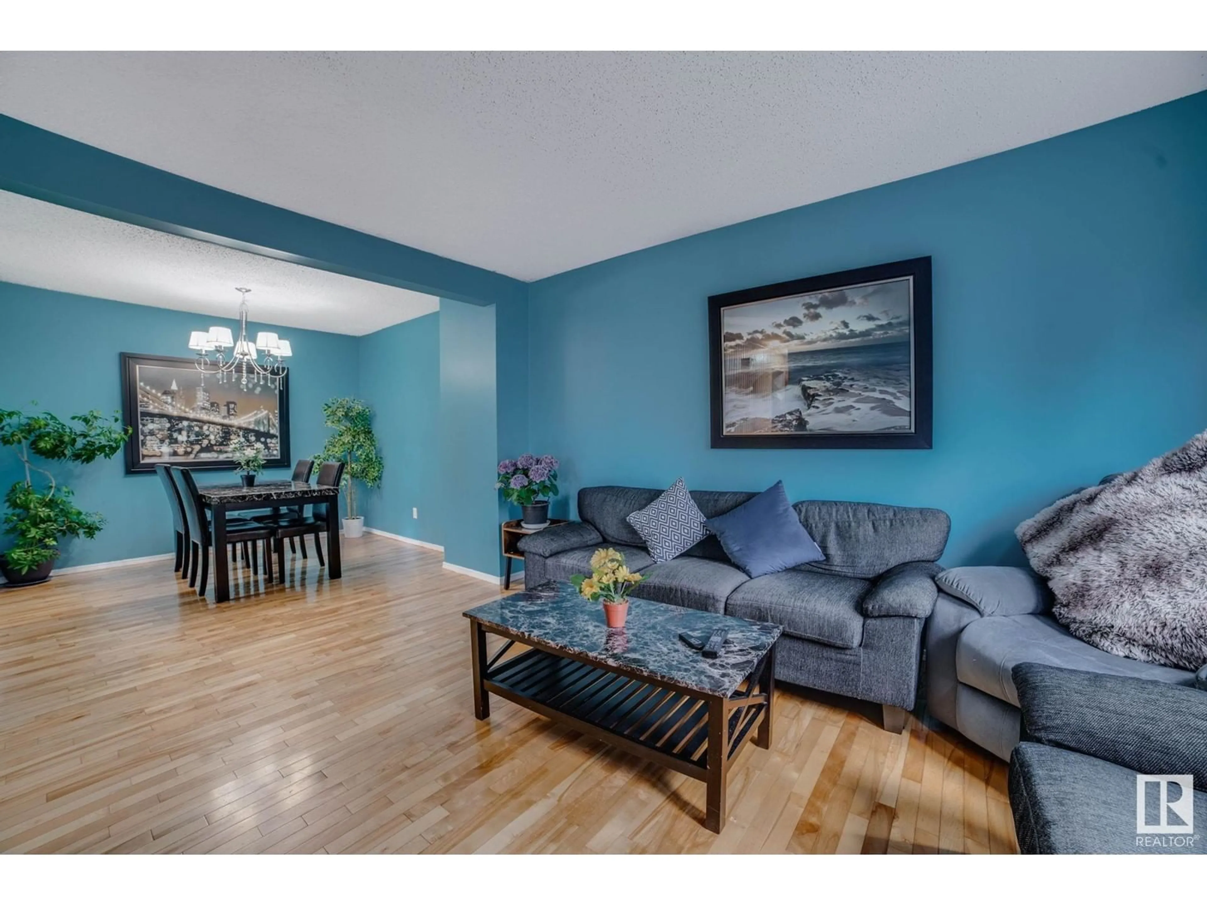 Living room with furniture, wood/laminate floor for 827 ERIN PL, Edmonton Alberta T5T1M6