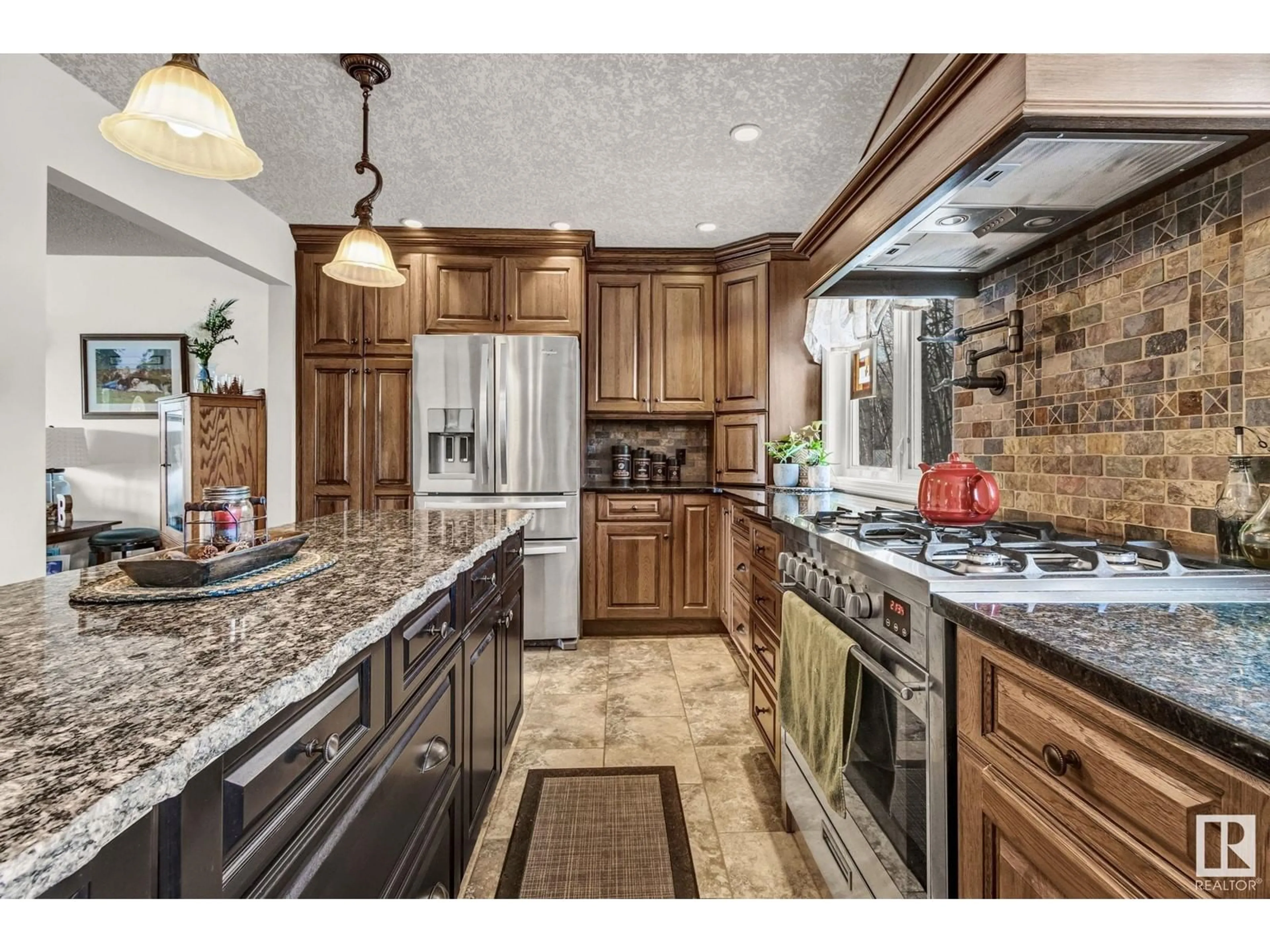 Open concept kitchen, ceramic/tile floor for 14 - 54006 RGE RD 274, Rural Parkland County Alberta T7X3S8