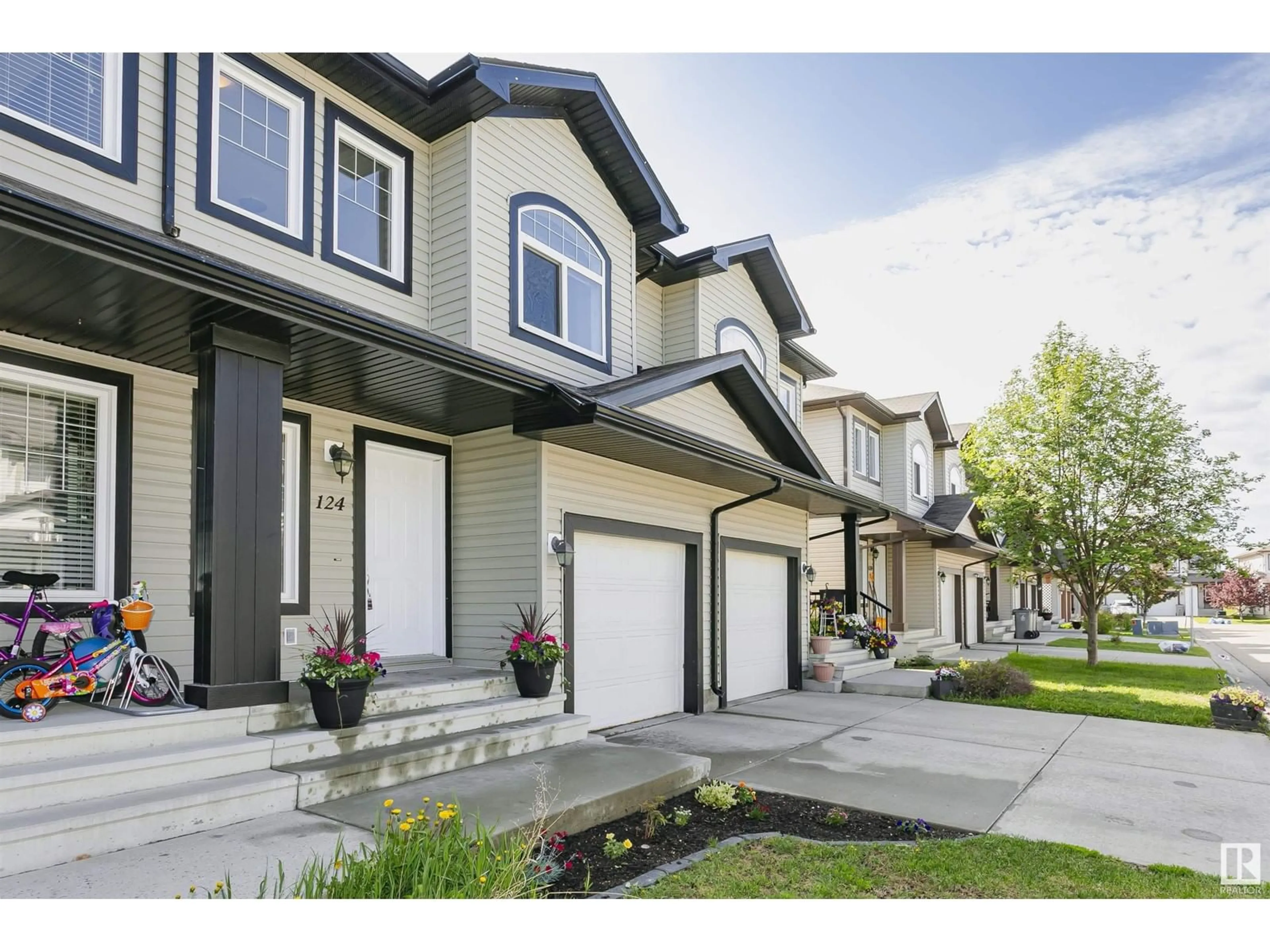 Home with vinyl exterior material, street for 124 101 DEER VALLEY DR, Leduc Alberta T9E0S3