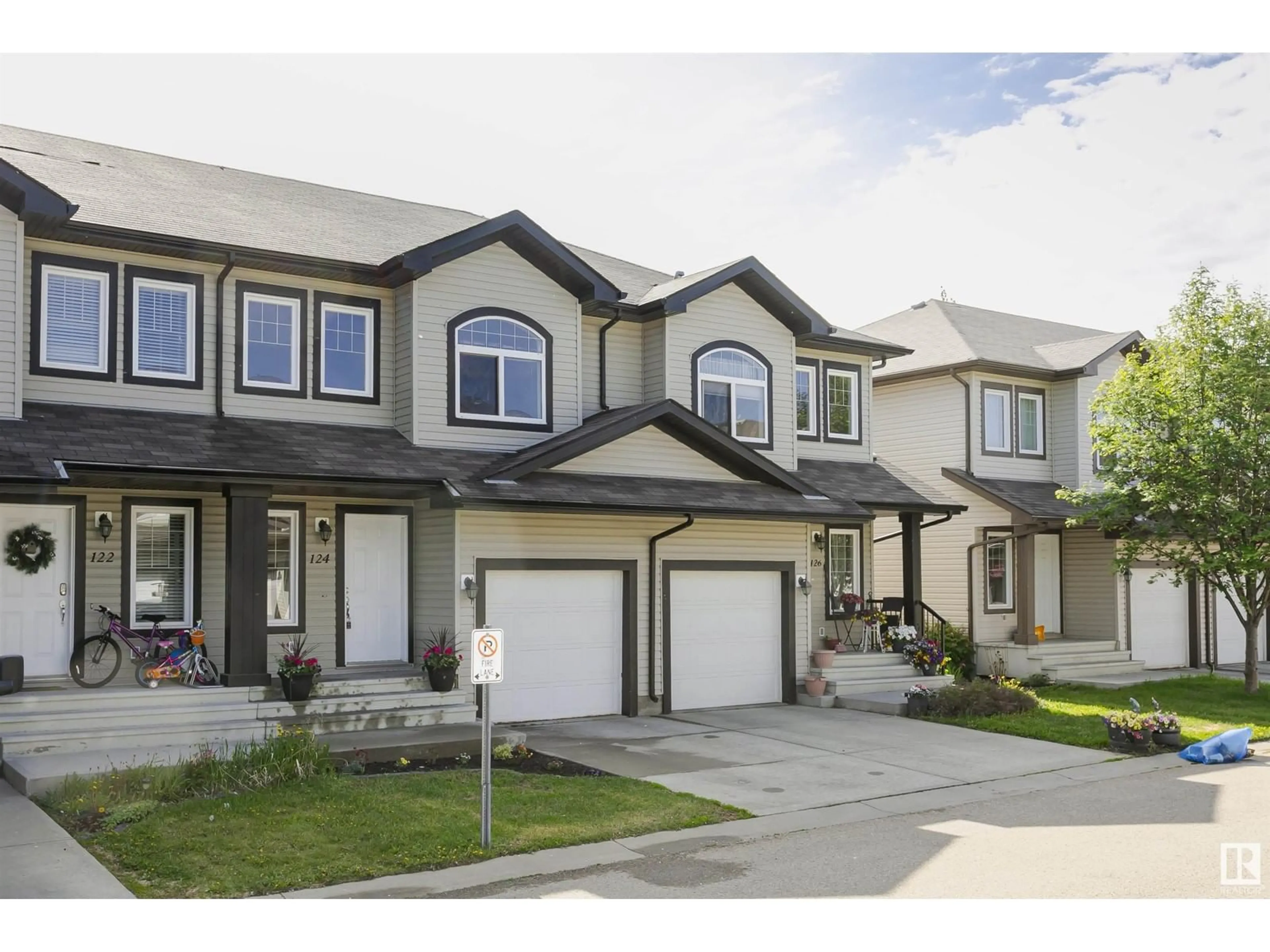 Home with vinyl exterior material, street for 124 101 DEER VALLEY DR, Leduc Alberta T9E0S3