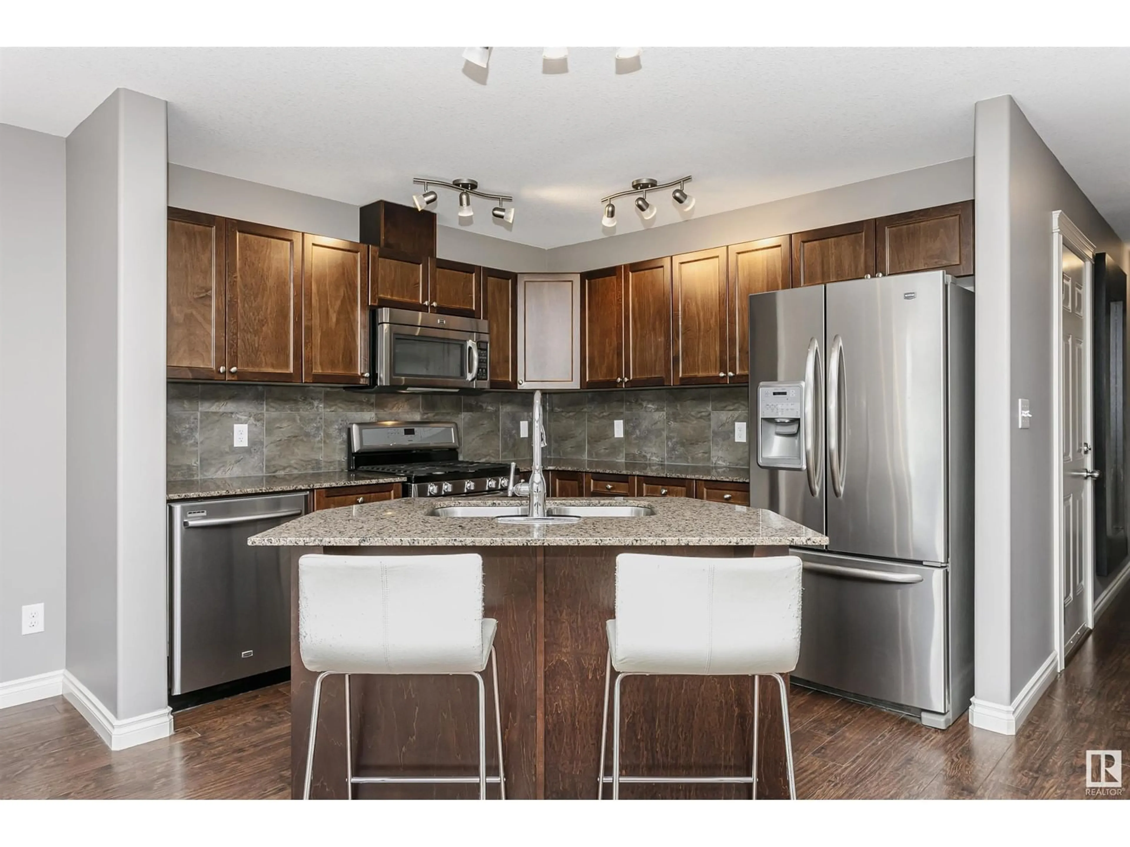 Open concept kitchen, unknown for 124 101 DEER VALLEY DR, Leduc Alberta T9E0S3