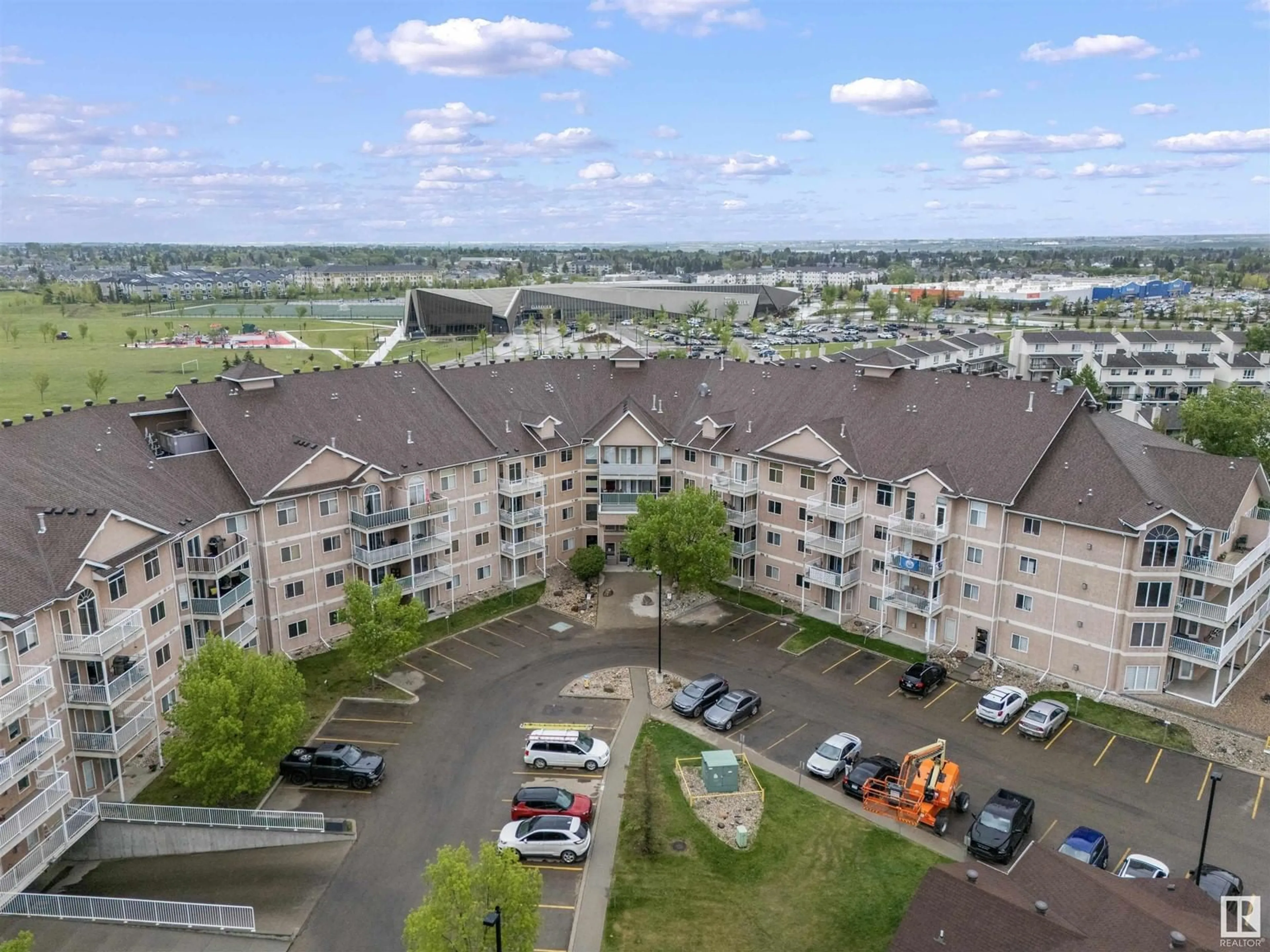 A pic from outside/outdoor area/front of a property/back of a property/a pic from drone, mountain view for #310 - 4312 139 AV, Edmonton Alberta T5Y3J4