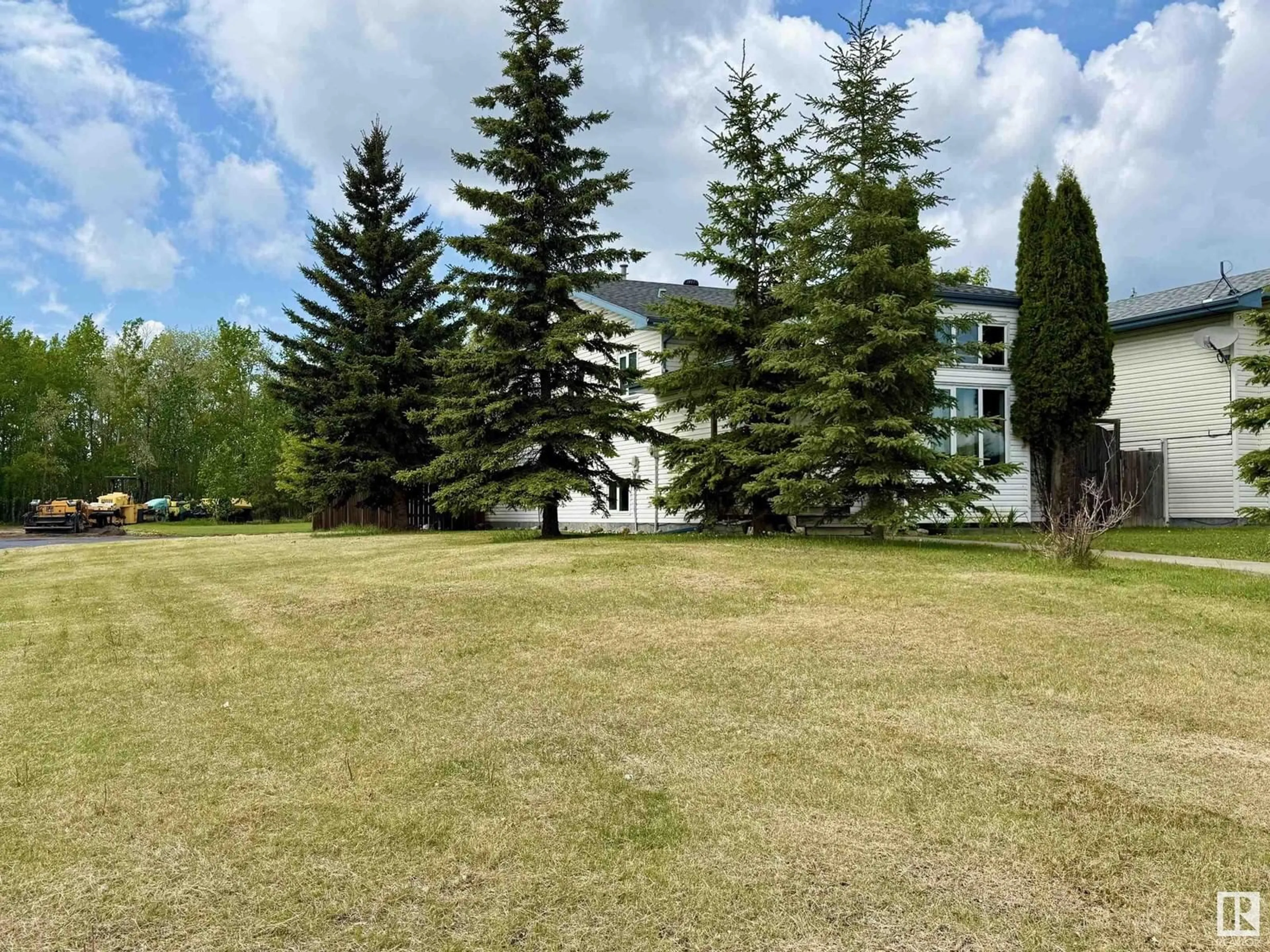 A pic from outside/outdoor area/front of a property/back of a property/a pic from drone, forest/trees view for B - 4515 33 ST, Athabasca Town Alberta T9S1P5