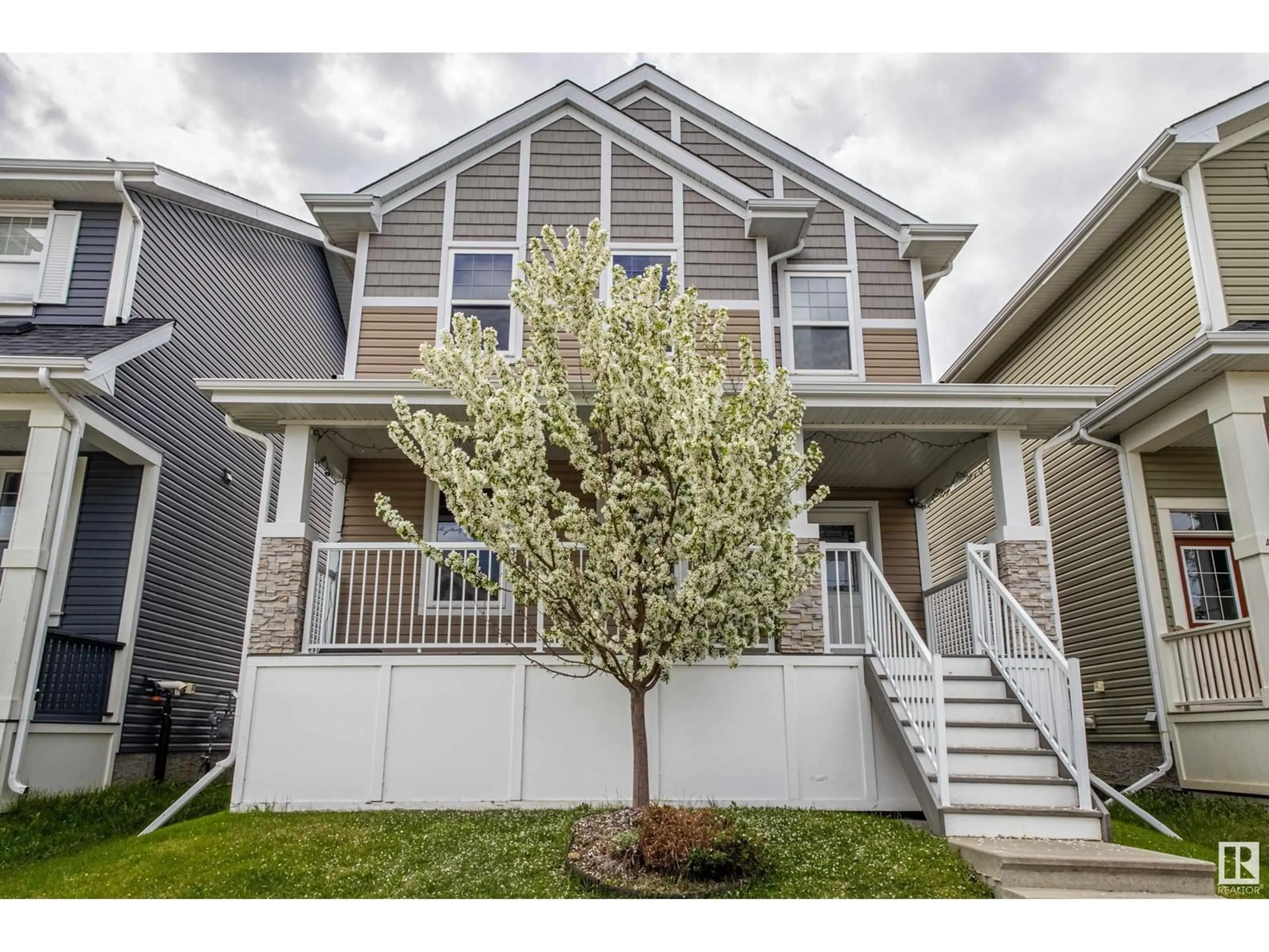Home with vinyl exterior material, street for 404 SIMMONDS WY, Leduc Alberta T9E0X3