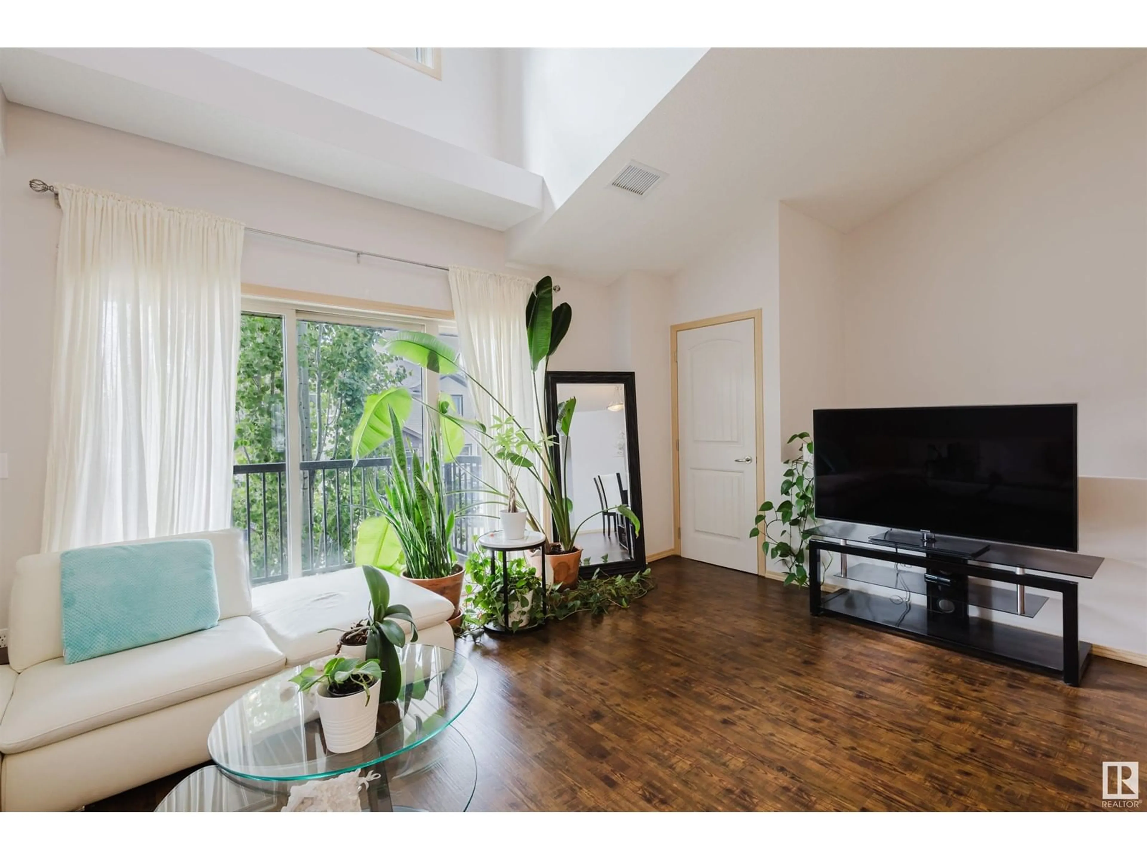 Living room with furniture, wood/laminate floor for #18 - 604 62 ST, Edmonton Alberta T6X0K4