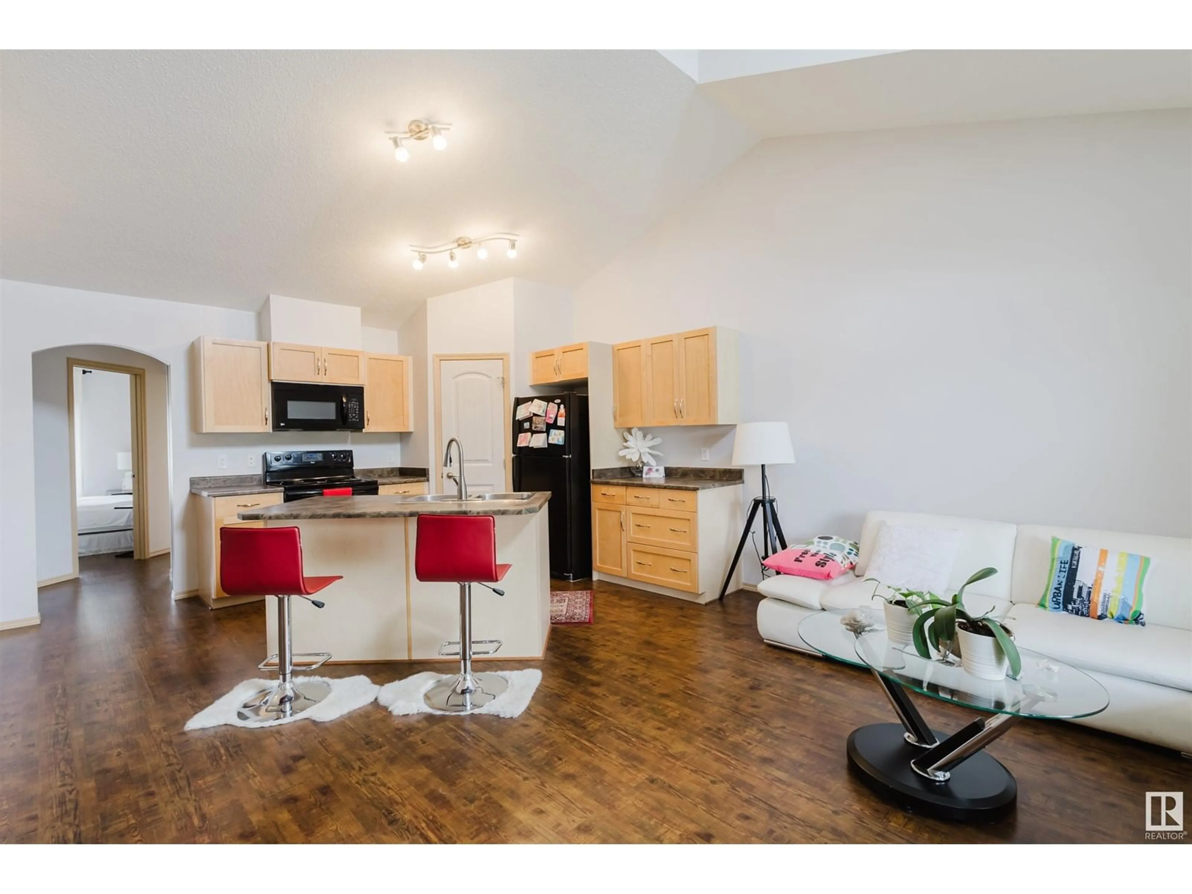Open concept kitchen, wood/laminate floor for #18 - 604 62 ST, Edmonton Alberta T6X0K4