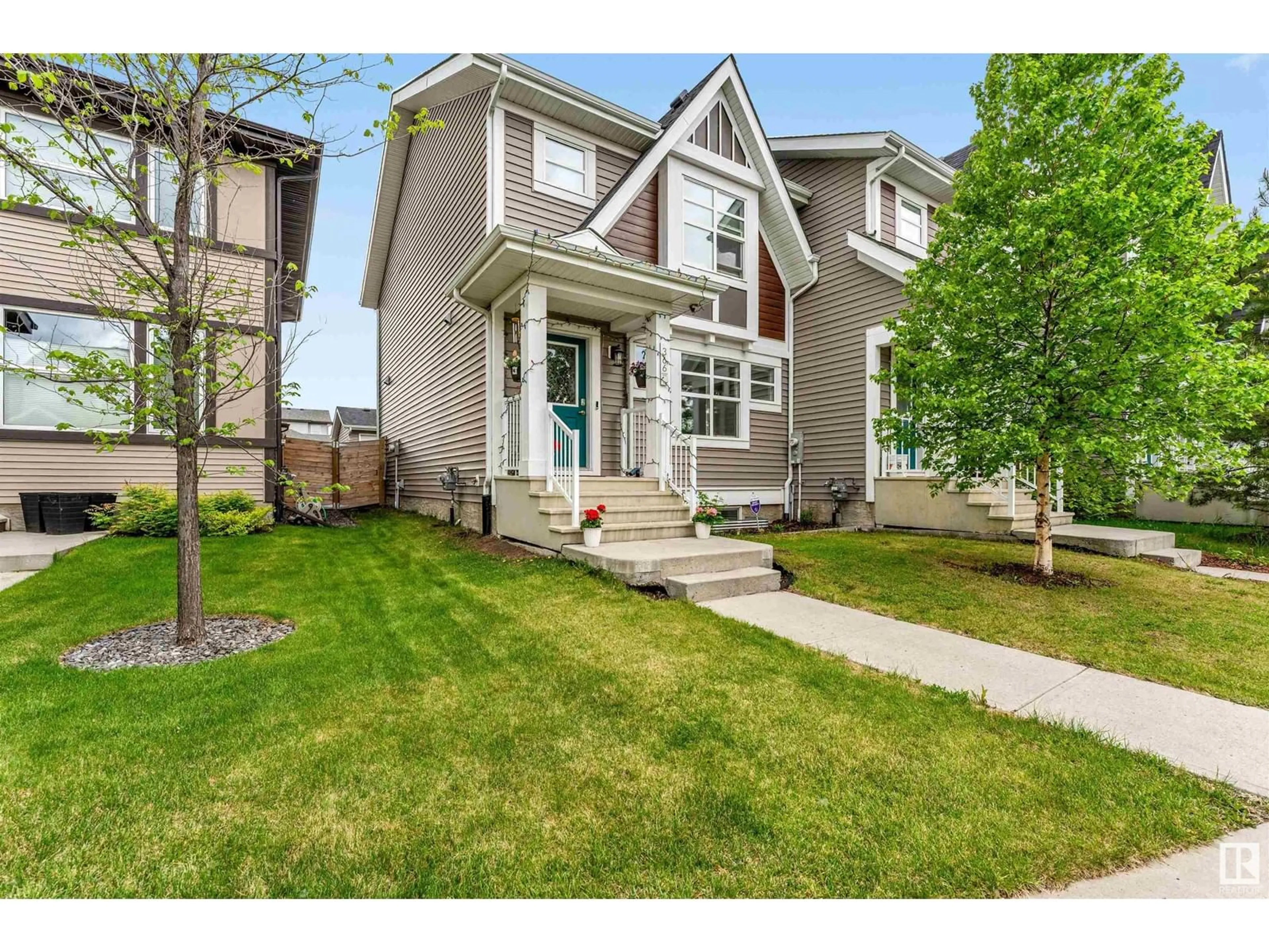 Home with vinyl exterior material, street for 366 CHARLESWORTH DR, Edmonton Alberta T6X2G5