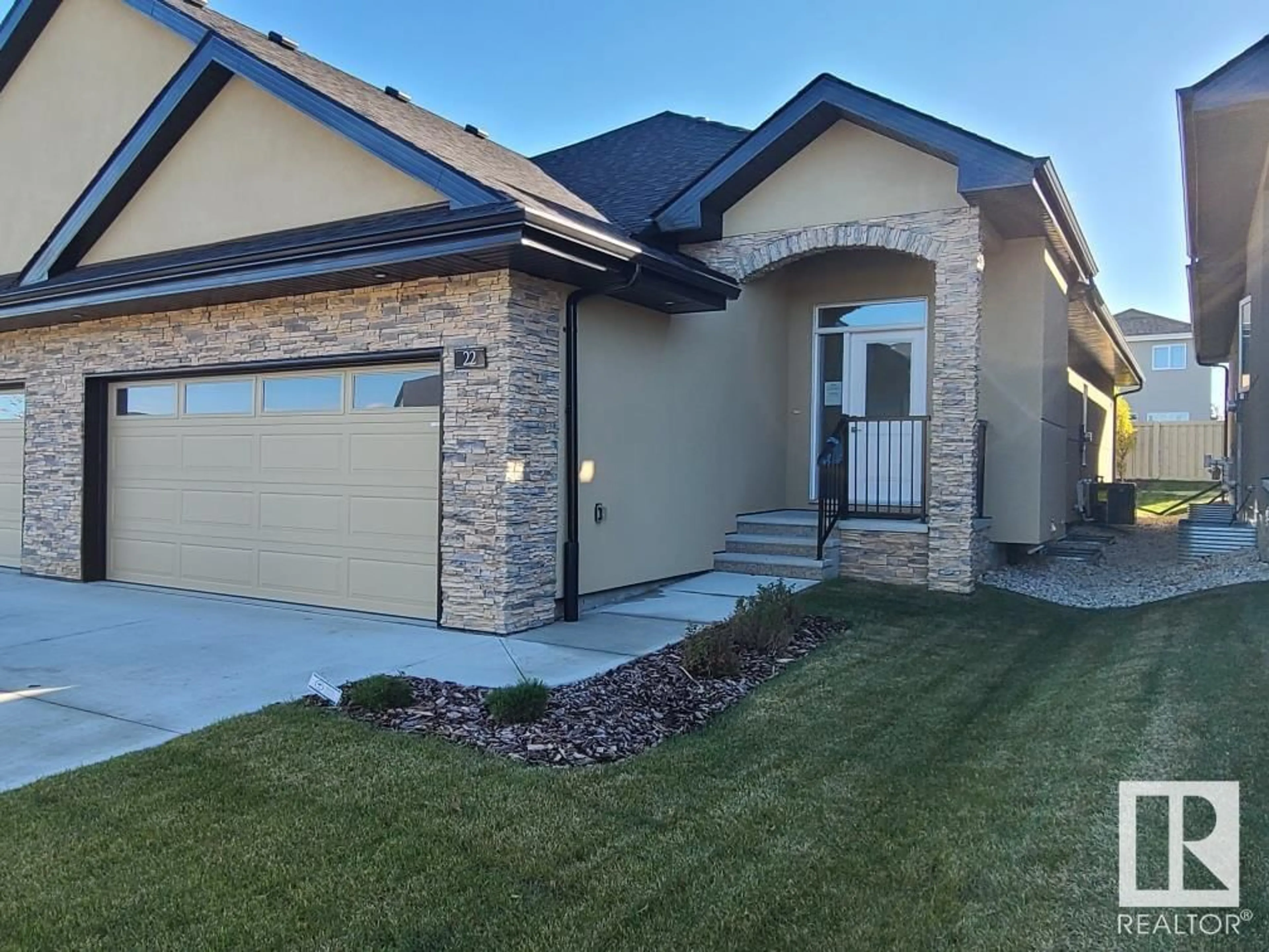 Home with brick exterior material, street for 22 104 ALLARD LI LI, Edmonton Alberta T6W2N2
