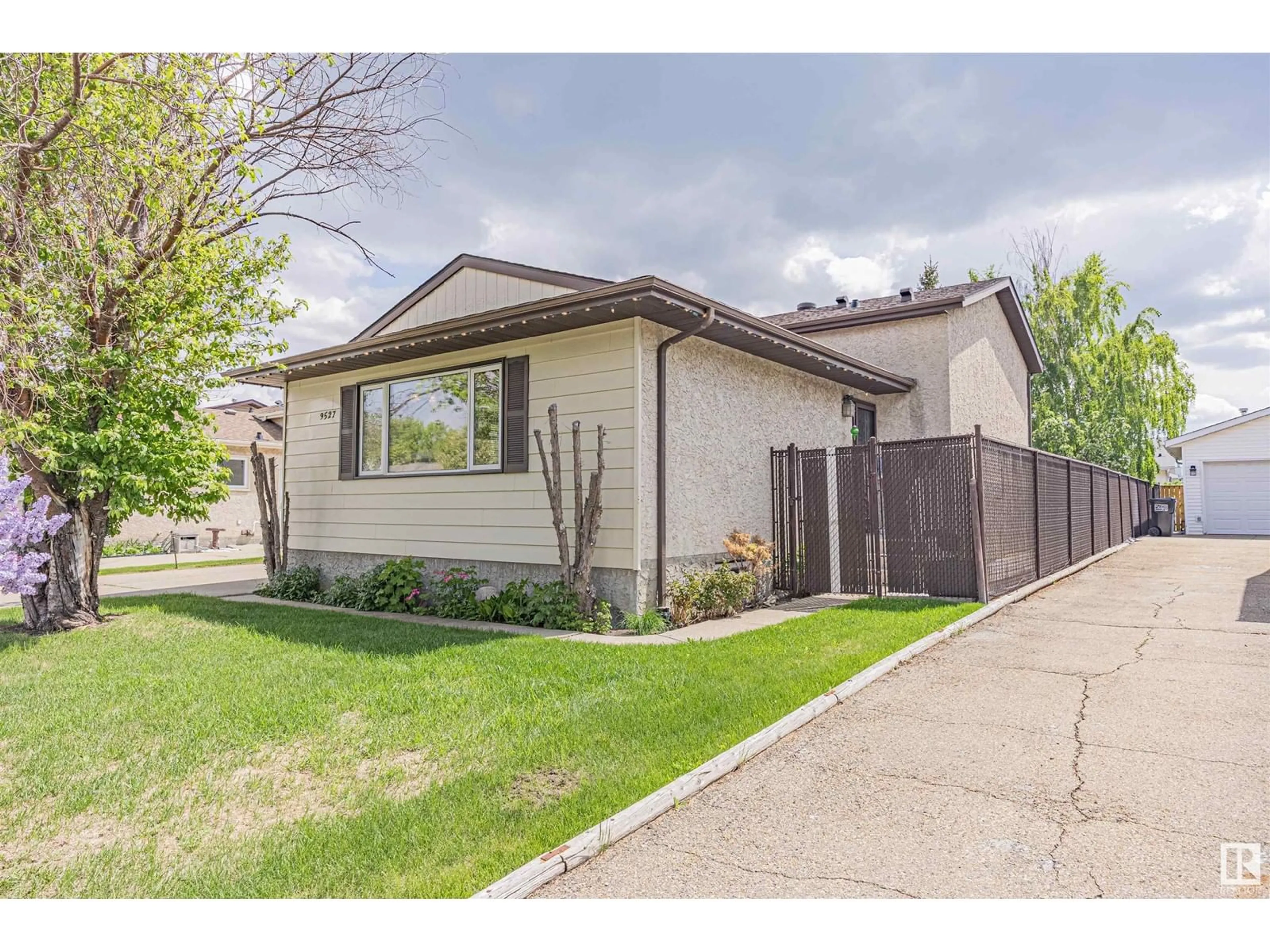 Home with vinyl exterior material, street for NW - 9527 178A AV, Edmonton Alberta T5Z2G8
