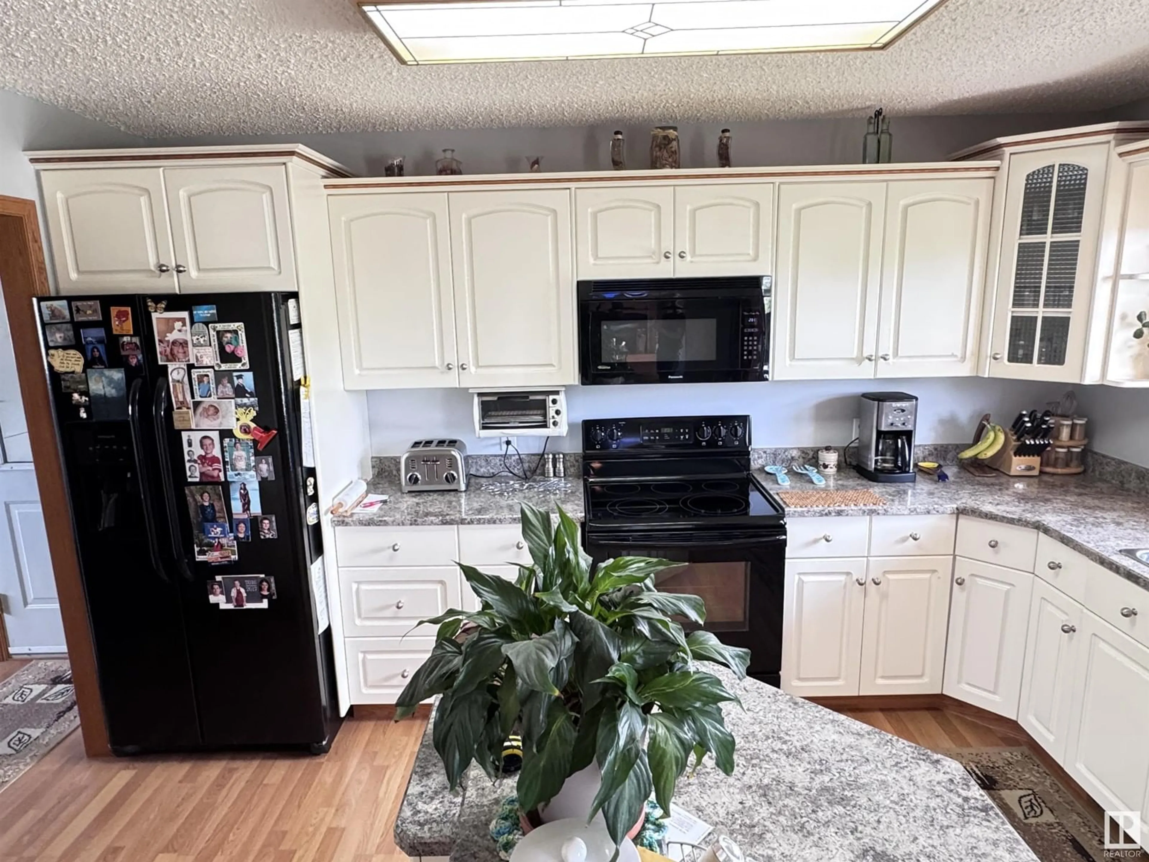Open concept kitchen, ceramic/tile floor for 5016 47 AV, Clyde Alberta T0G2P0