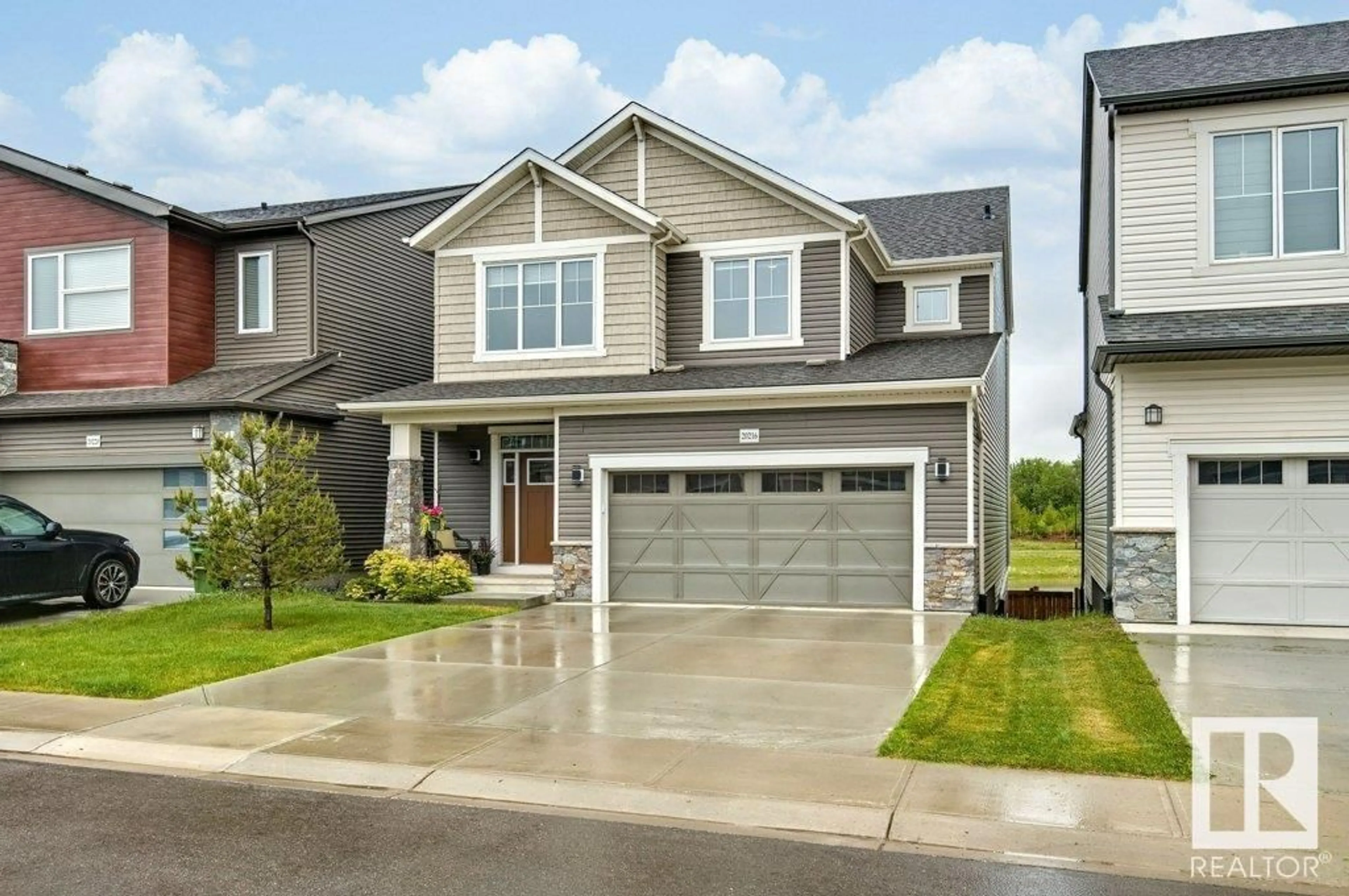 Home with vinyl exterior material, street for NW - 20217 17 AV, Edmonton Alberta T6M1K6