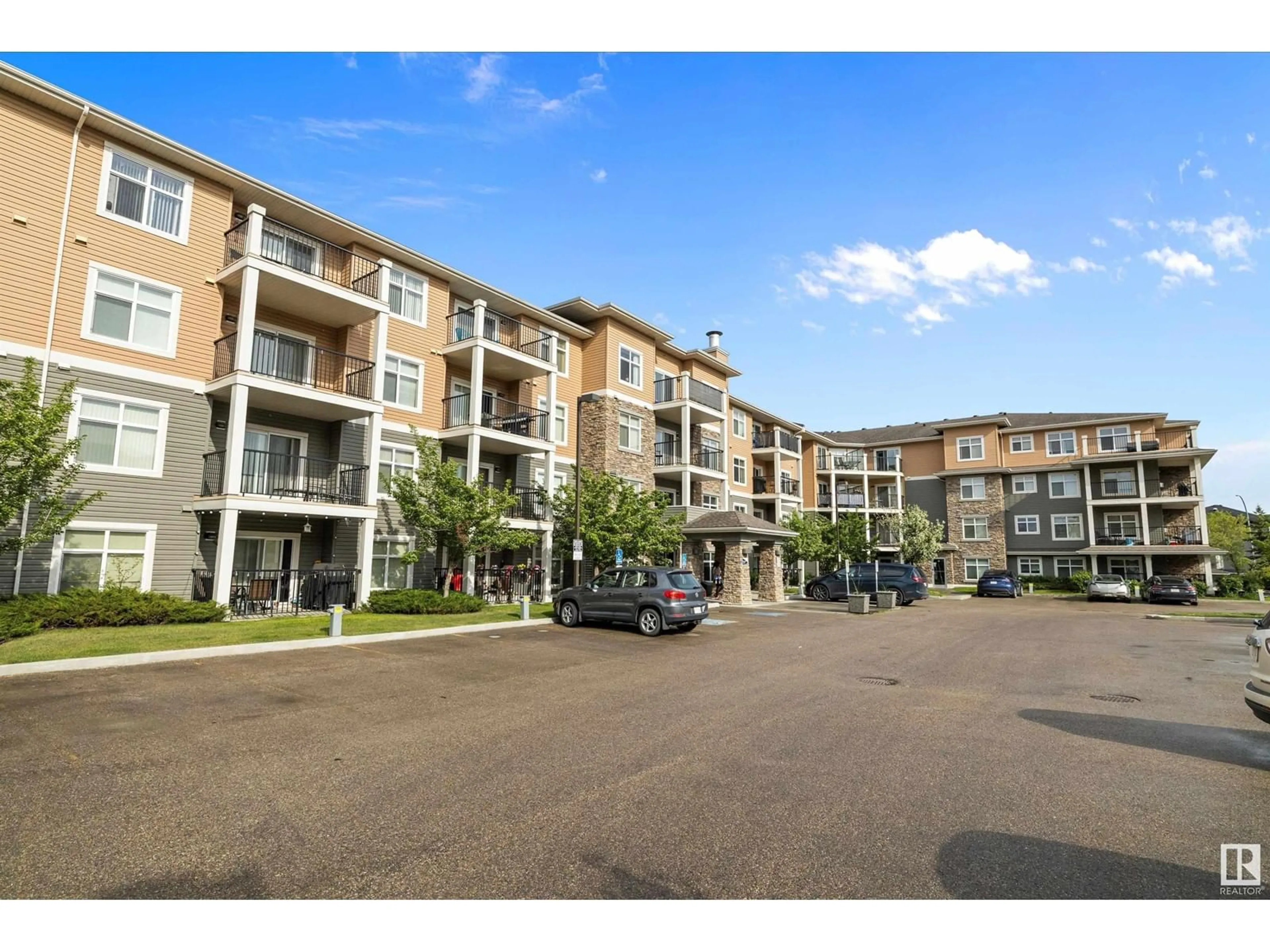A pic from outside/outdoor area/front of a property/back of a property/a pic from drone, unknown for #314 - 6070 SCHONSEE WY, Edmonton Alberta T5Z0G8