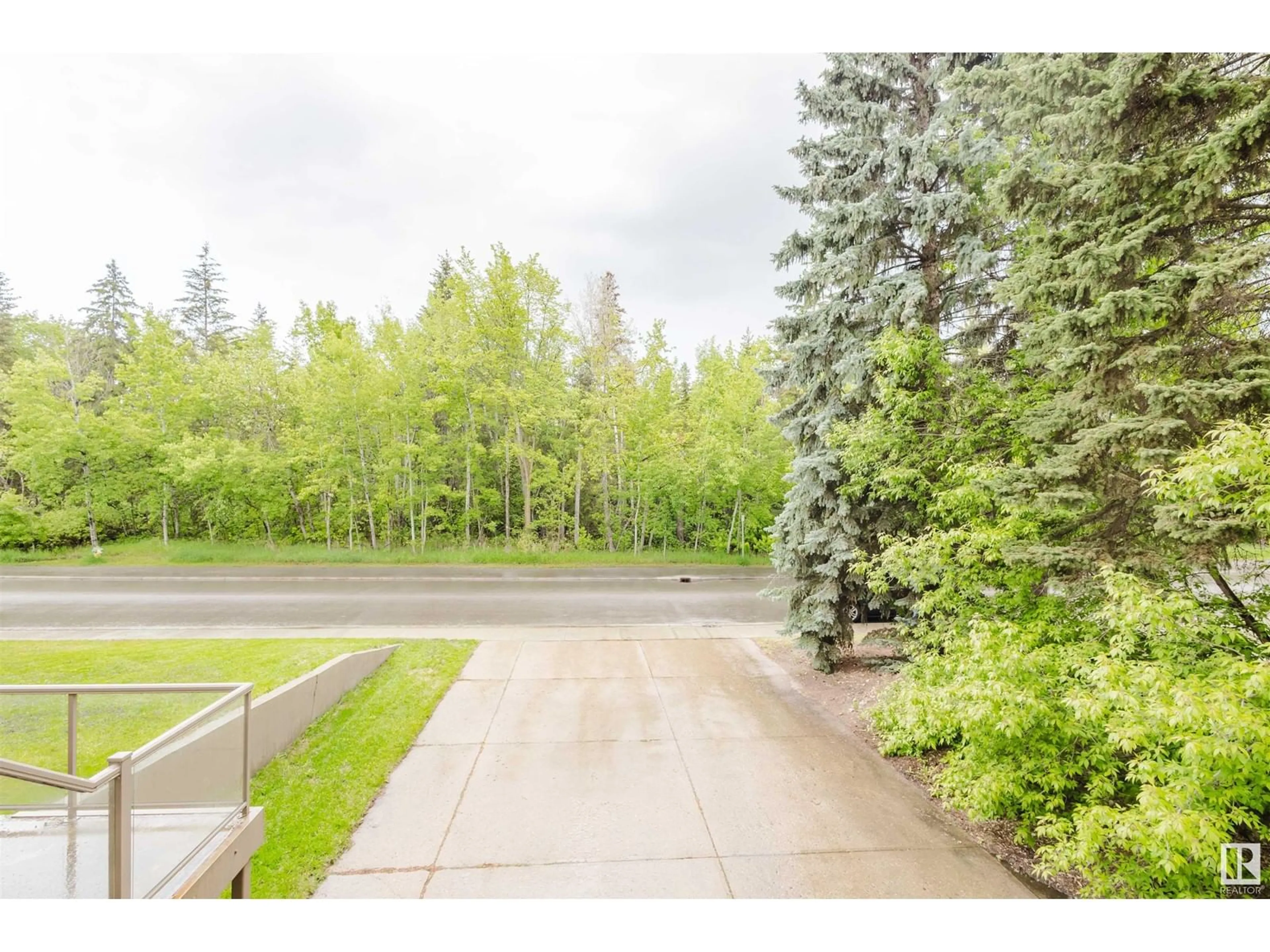 Patio, forest/trees view for 12603 GRAND VIEW DR, Edmonton Alberta T6H4K5