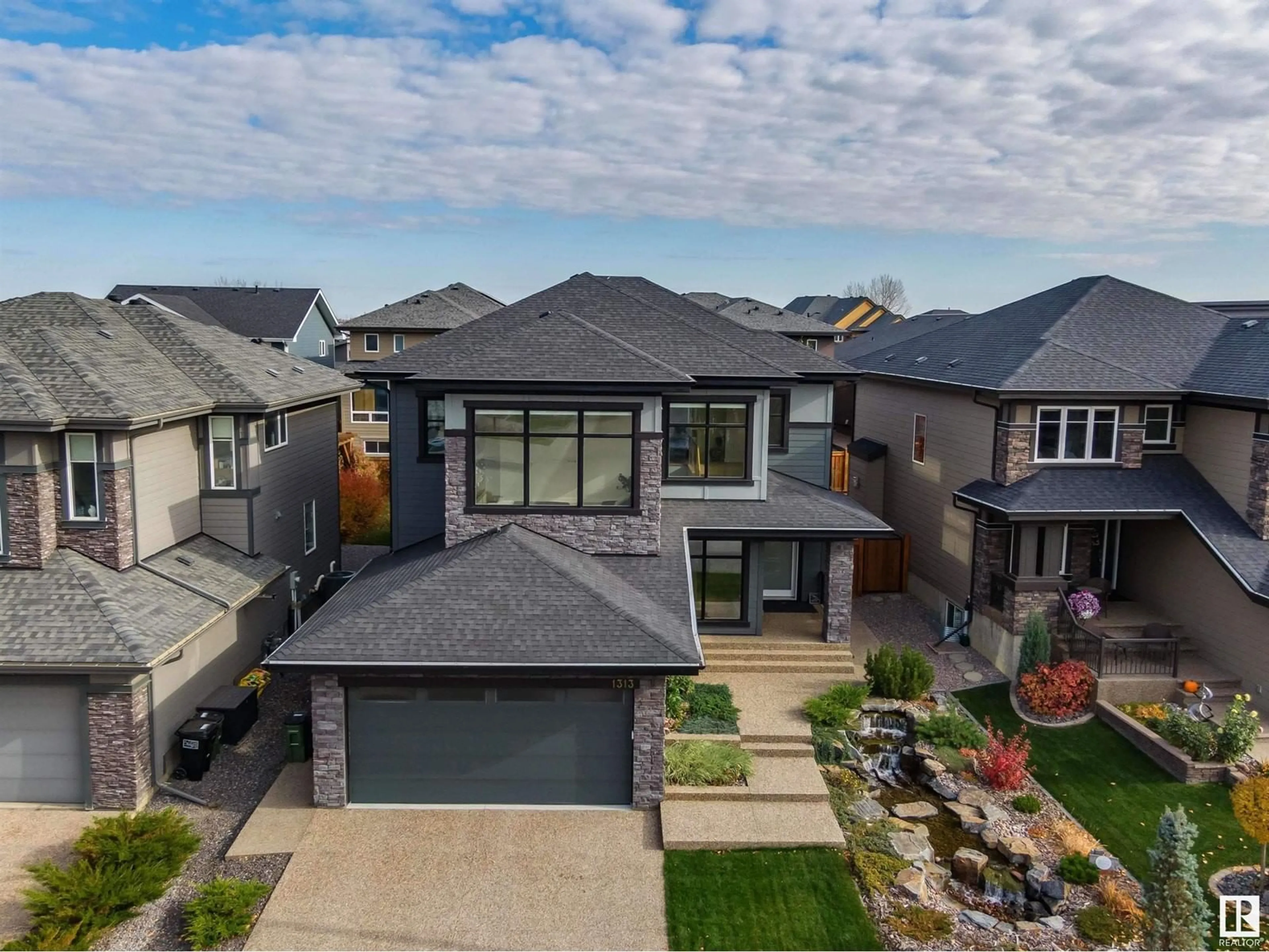 A pic from outside/outdoor area/front of a property/back of a property/a pic from drone, street for 1313 HAINSTOCK WY, Edmonton Alberta T6W3B6