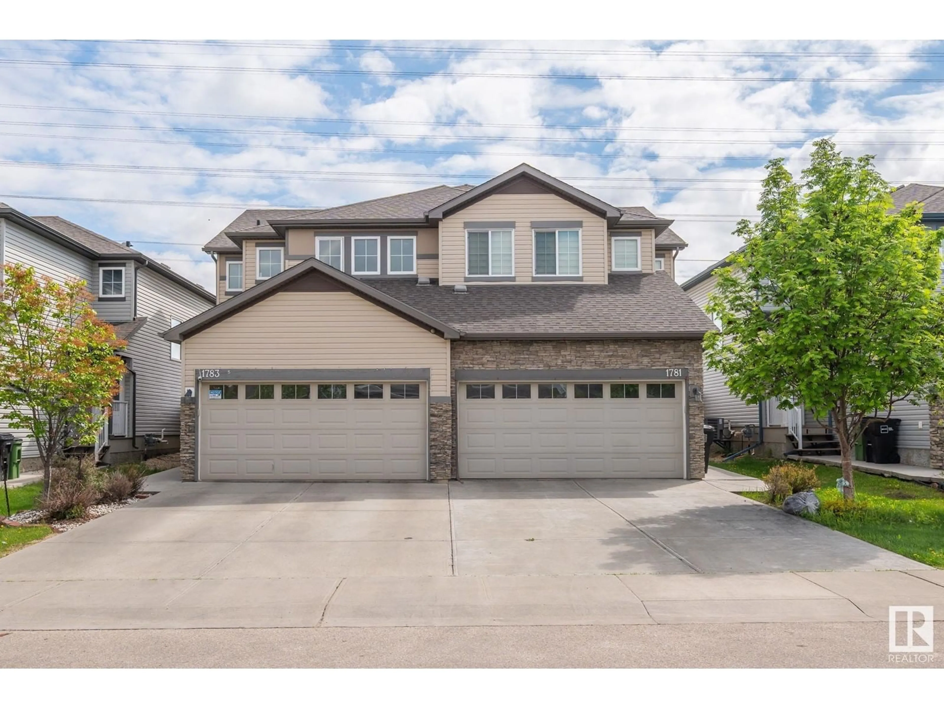 Home with vinyl exterior material, street for 1783 28 STREET, Edmonton Alberta T6T0S7
