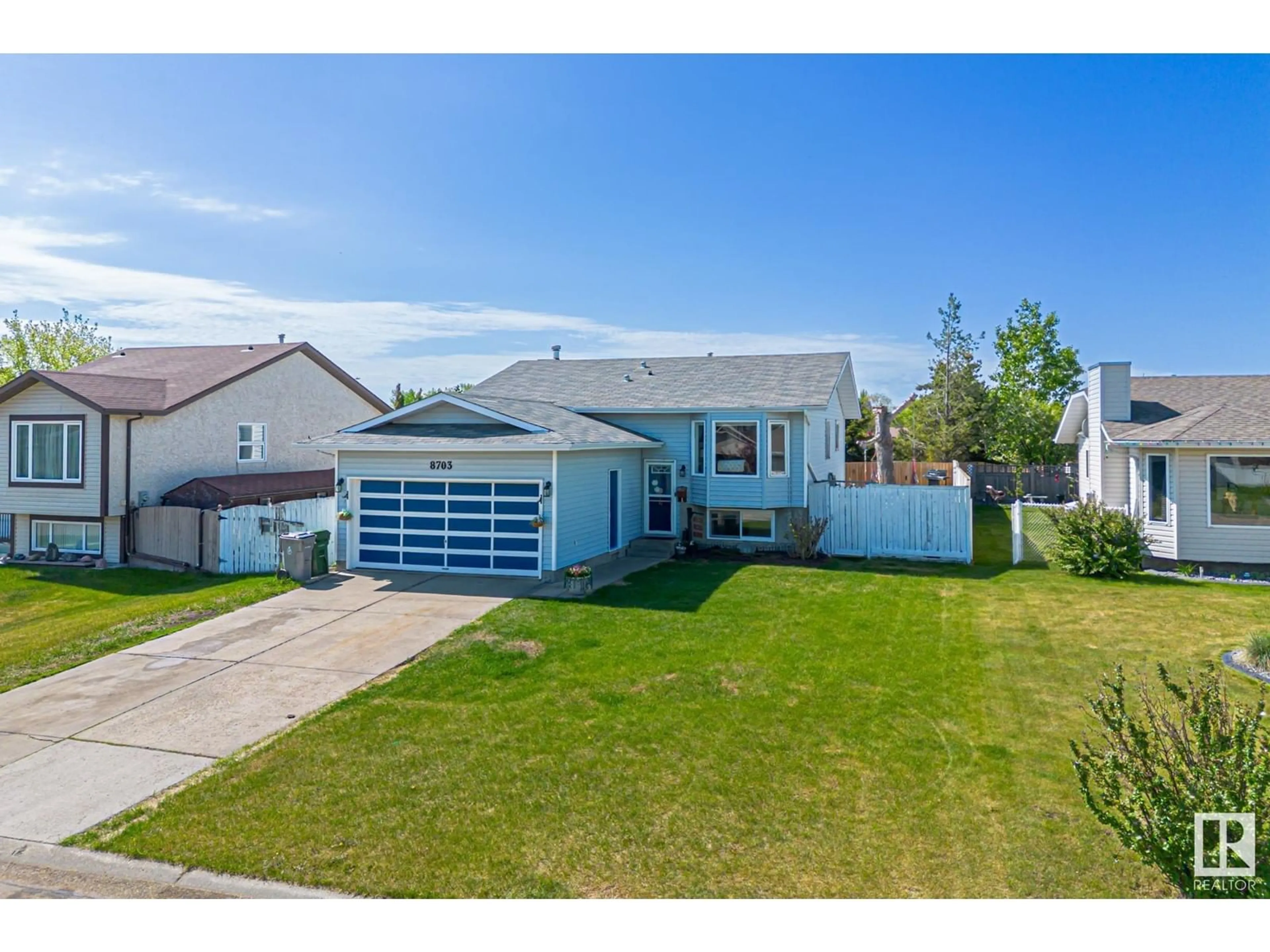 A pic from outside/outdoor area/front of a property/back of a property/a pic from drone, street for 8703 104 AV, Morinville Alberta T8R1C4