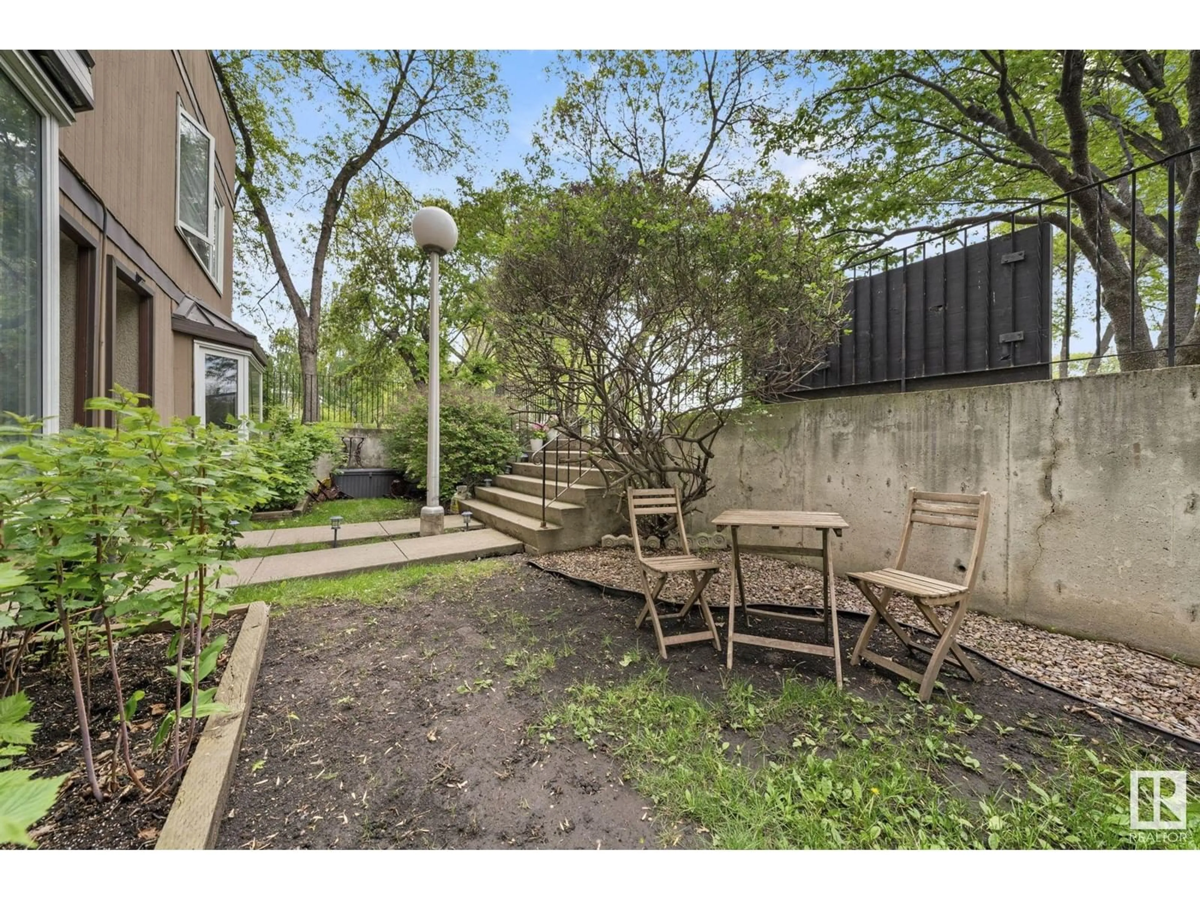 Patio, street for 10520 84 AV, Edmonton Alberta T6E2H4