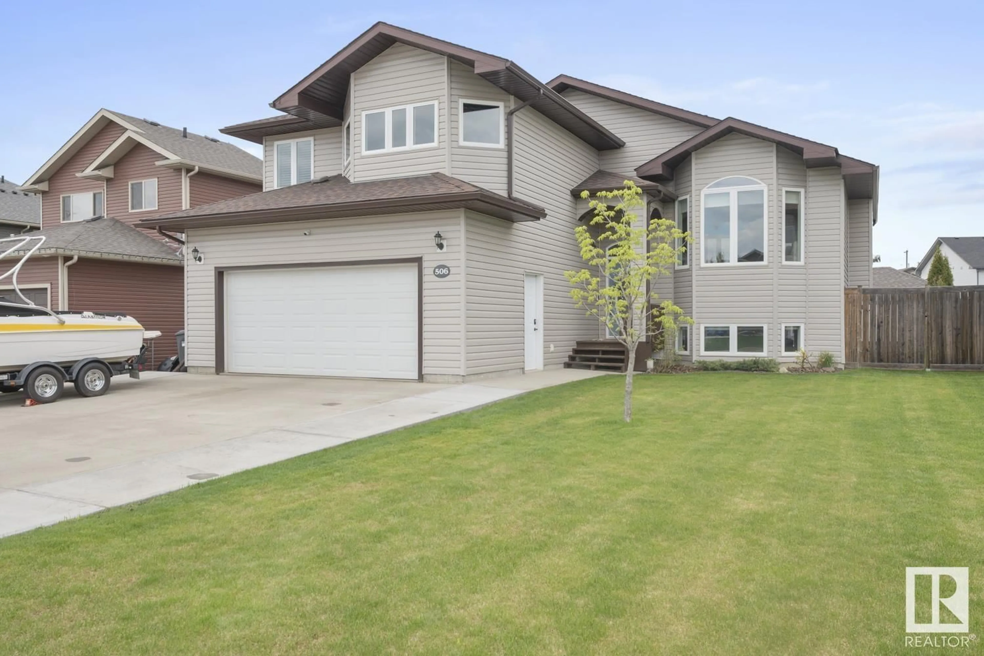 Home with vinyl exterior material, street for 506 26 ST, Cold Lake Alberta T9M0B2