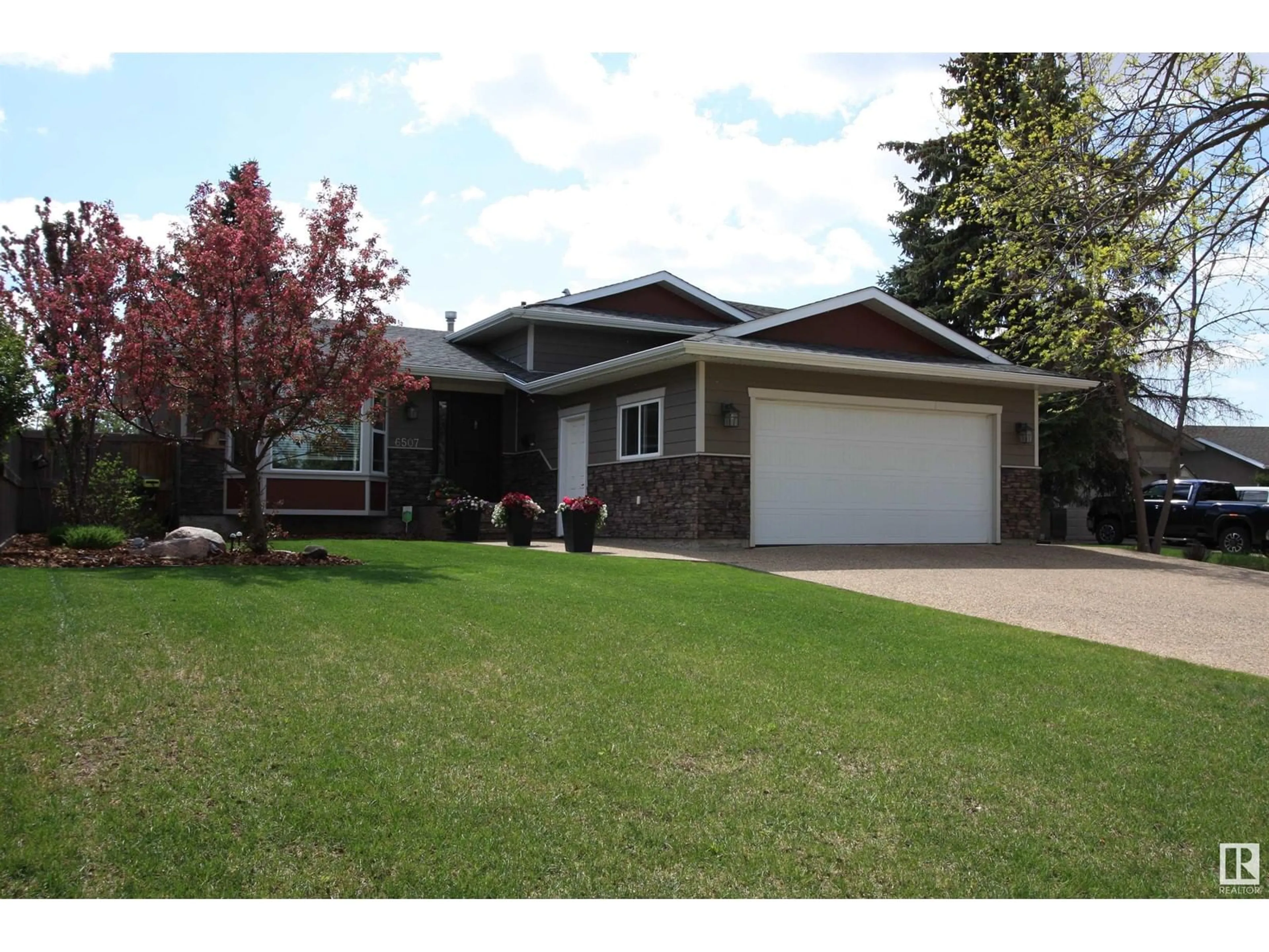 Home with vinyl exterior material, street for 6507 37 AV, Camrose Alberta T4V3J5