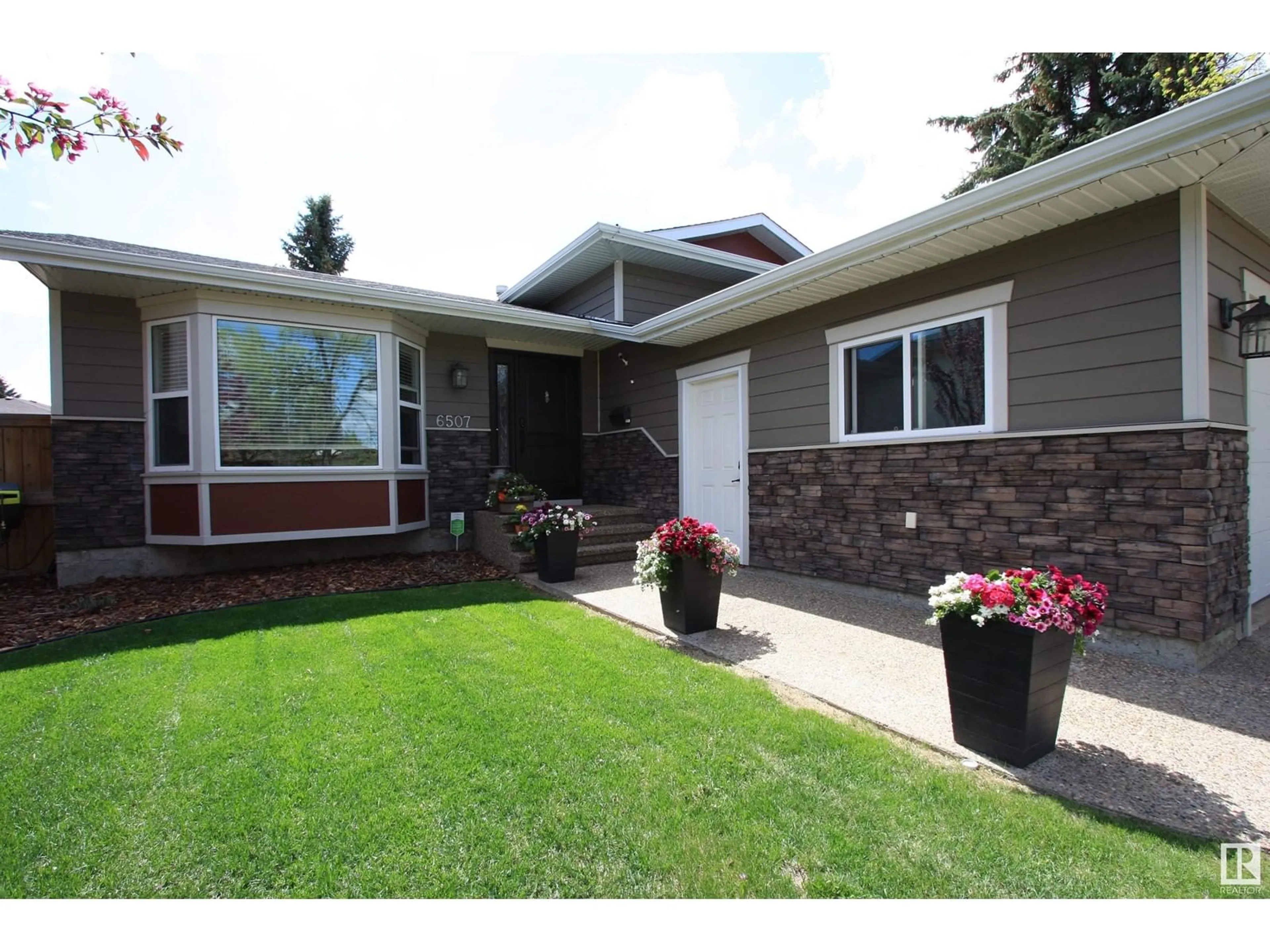 Home with vinyl exterior material, street for 6507 37 AV, Camrose Alberta T4V3J5