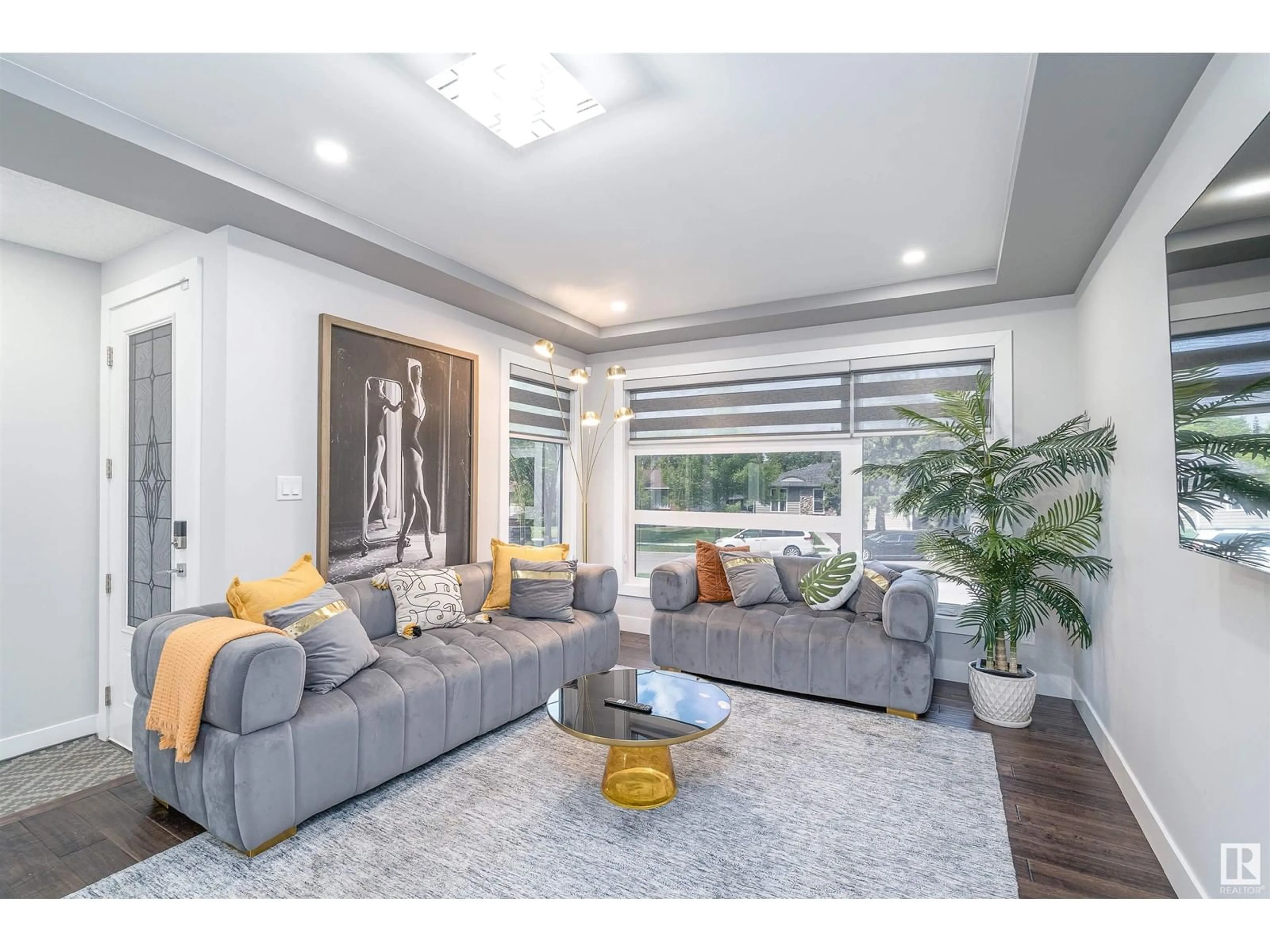 Living room with furniture, unknown for NW - 10909 60 AV, Edmonton Alberta T6H1H8