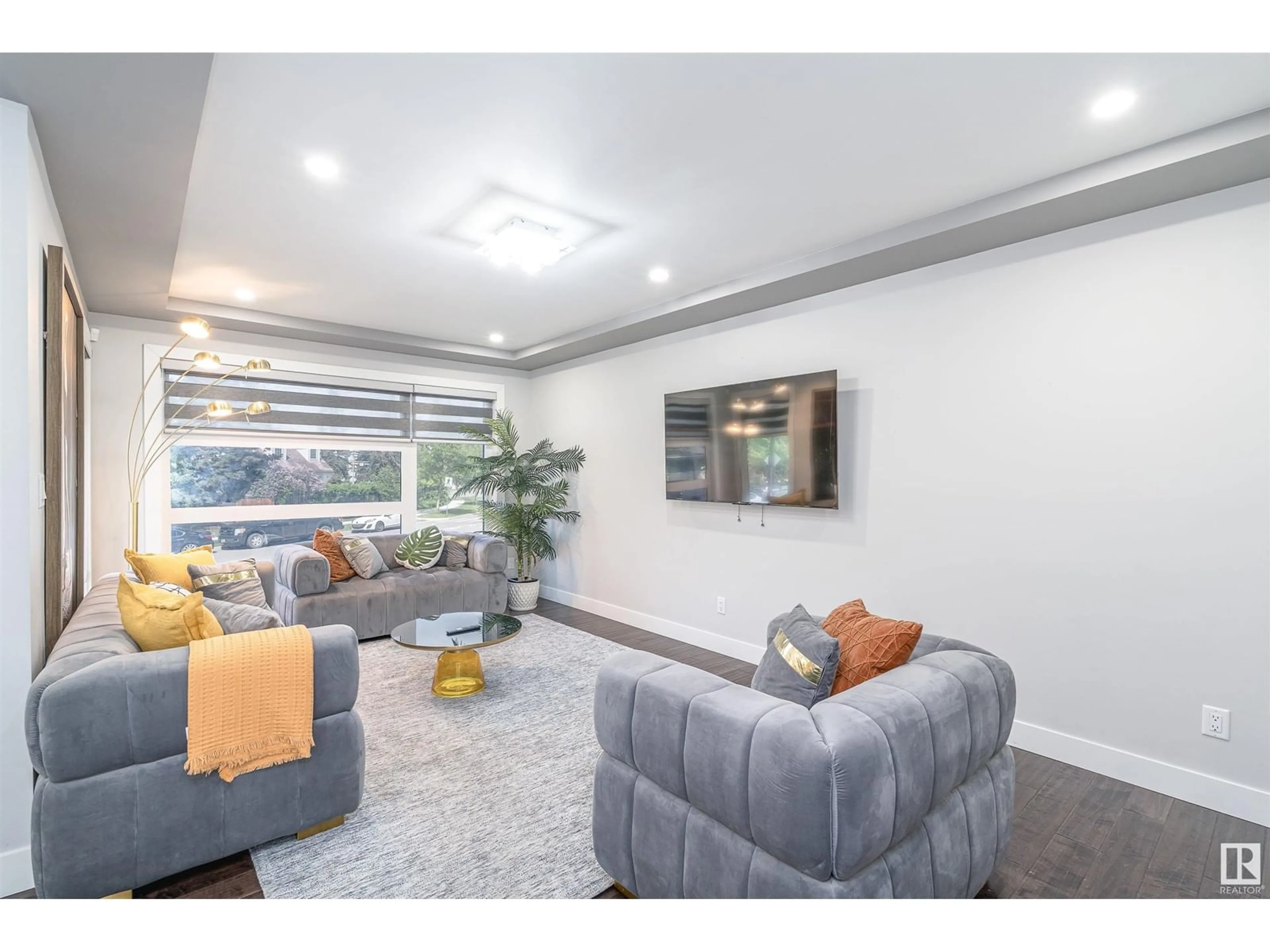 Living room with furniture, unknown for NW - 10909 60 AV, Edmonton Alberta T6H1H8