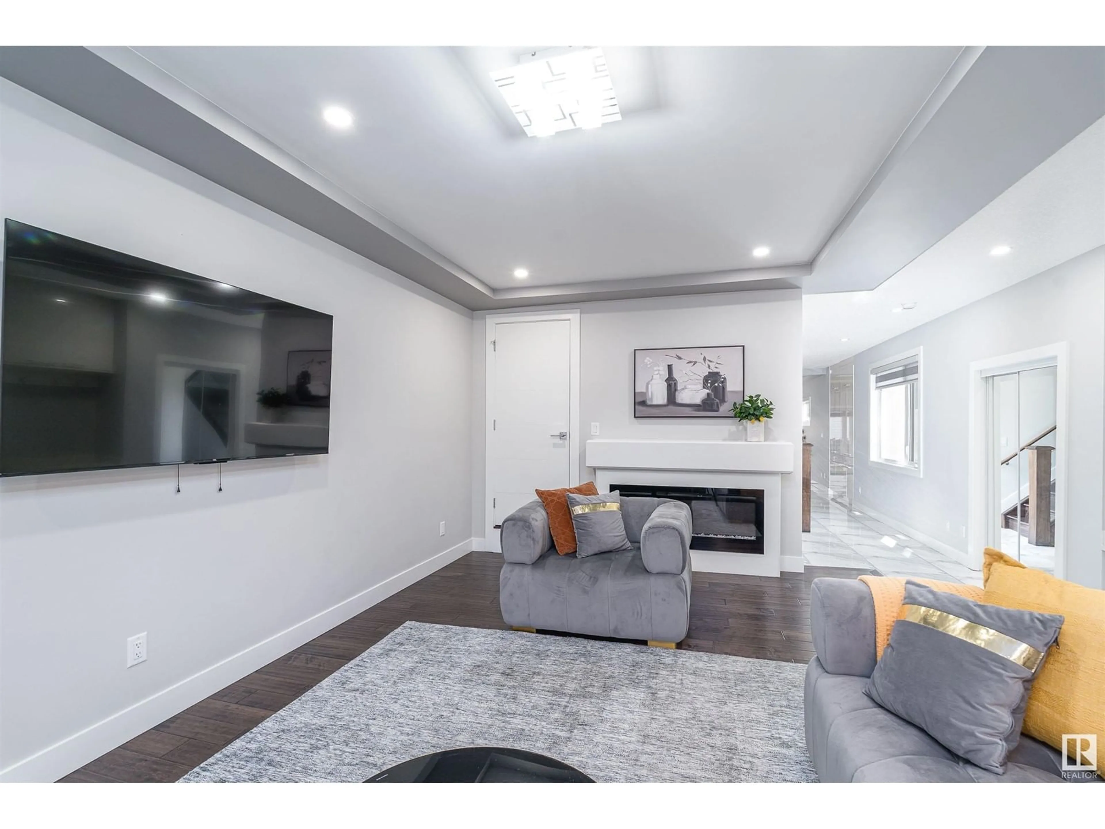 Living room with furniture, unknown for NW - 10909 60 AV, Edmonton Alberta T6H1H8