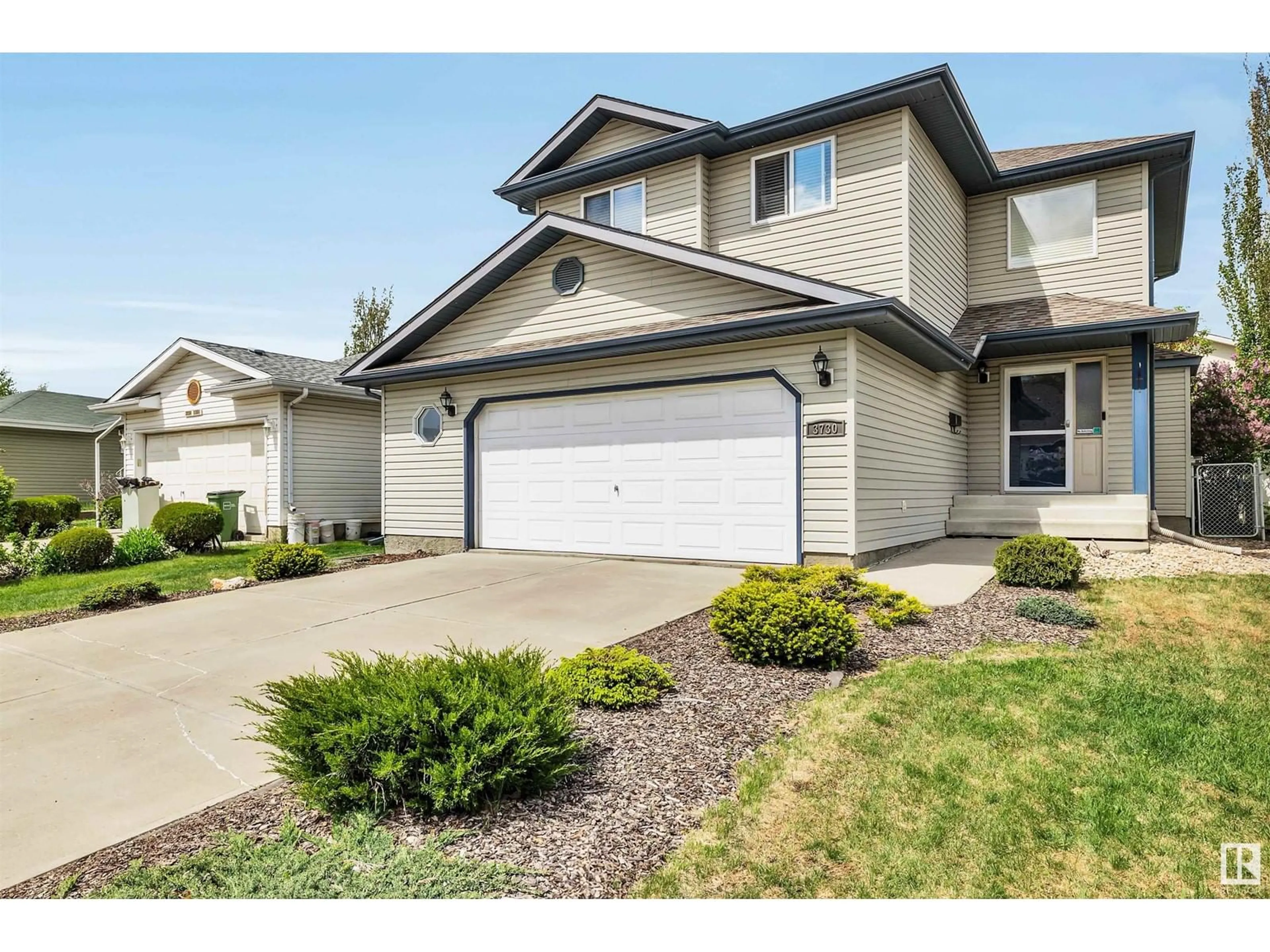 Home with vinyl exterior material, street for 3730 130A AV, Edmonton Alberta T5A5A3