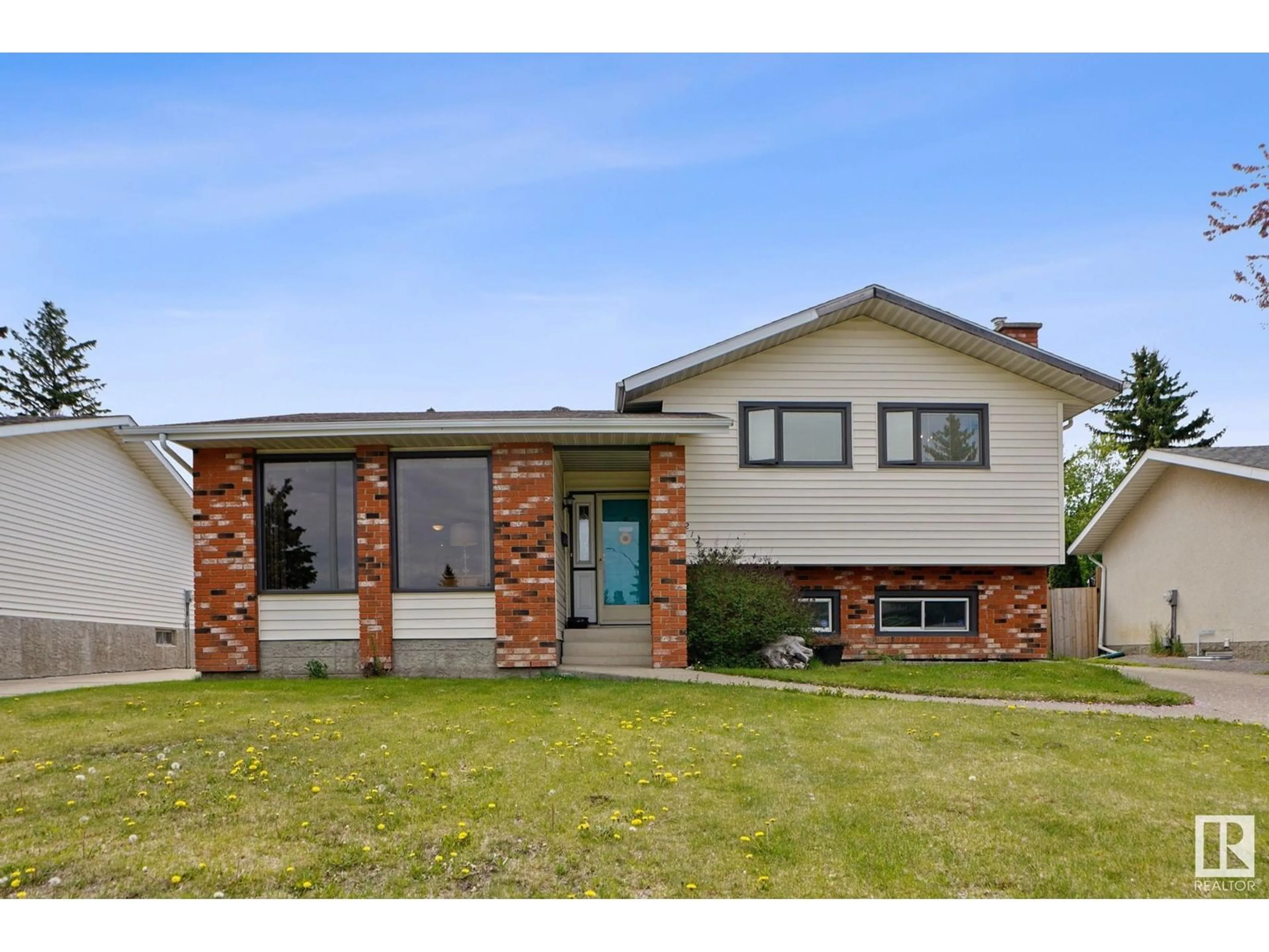 Home with brick exterior material, street for 2141 78 ST, Edmonton Alberta T6K2E4