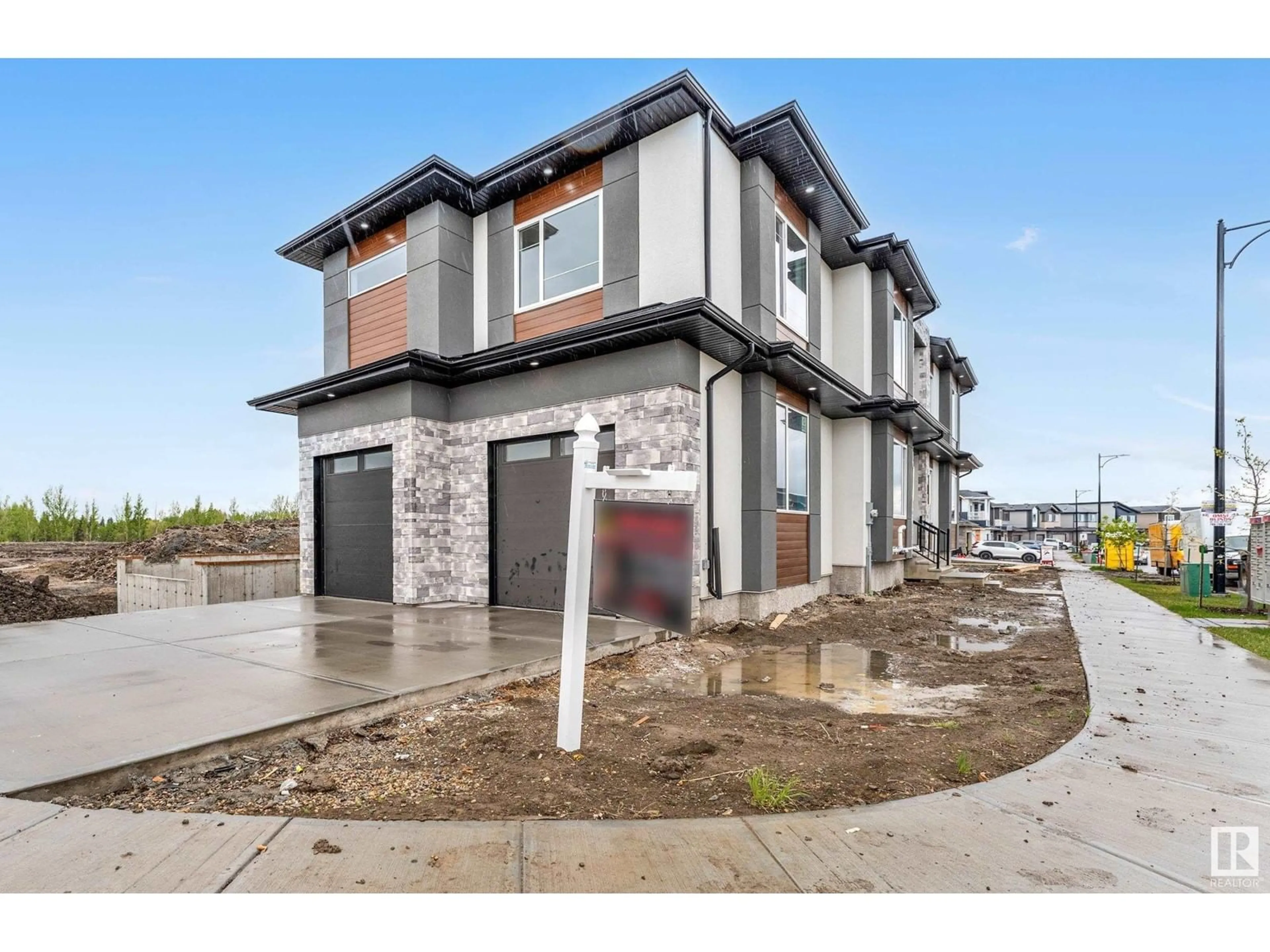 Home with brick exterior material, street for NE - 6304 20 ST, Rural Leduc County Alberta T4X3C9