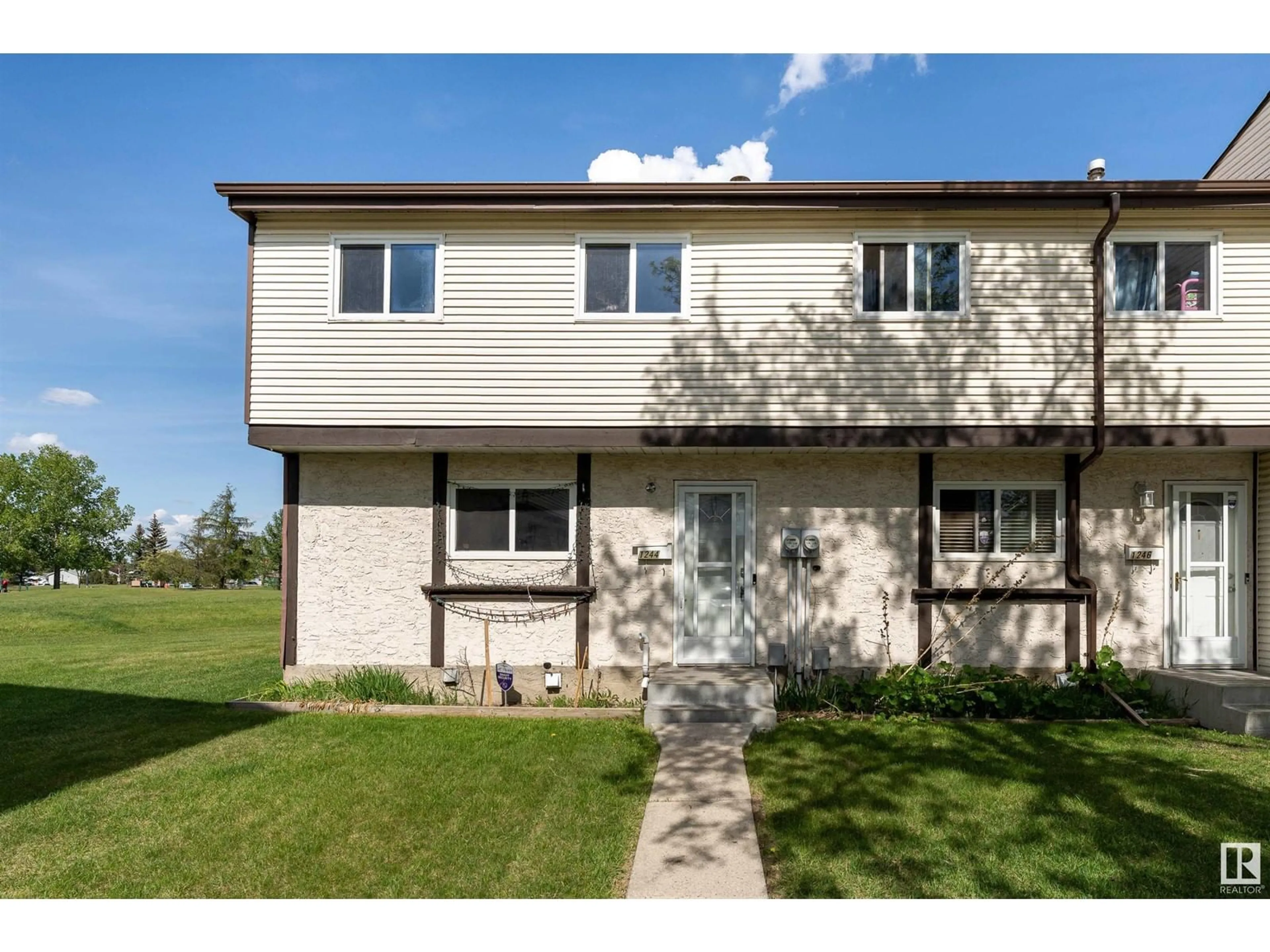 Home with vinyl exterior material, street for NW - 1244 LAKEWOOD W, Edmonton Alberta T6K3P2