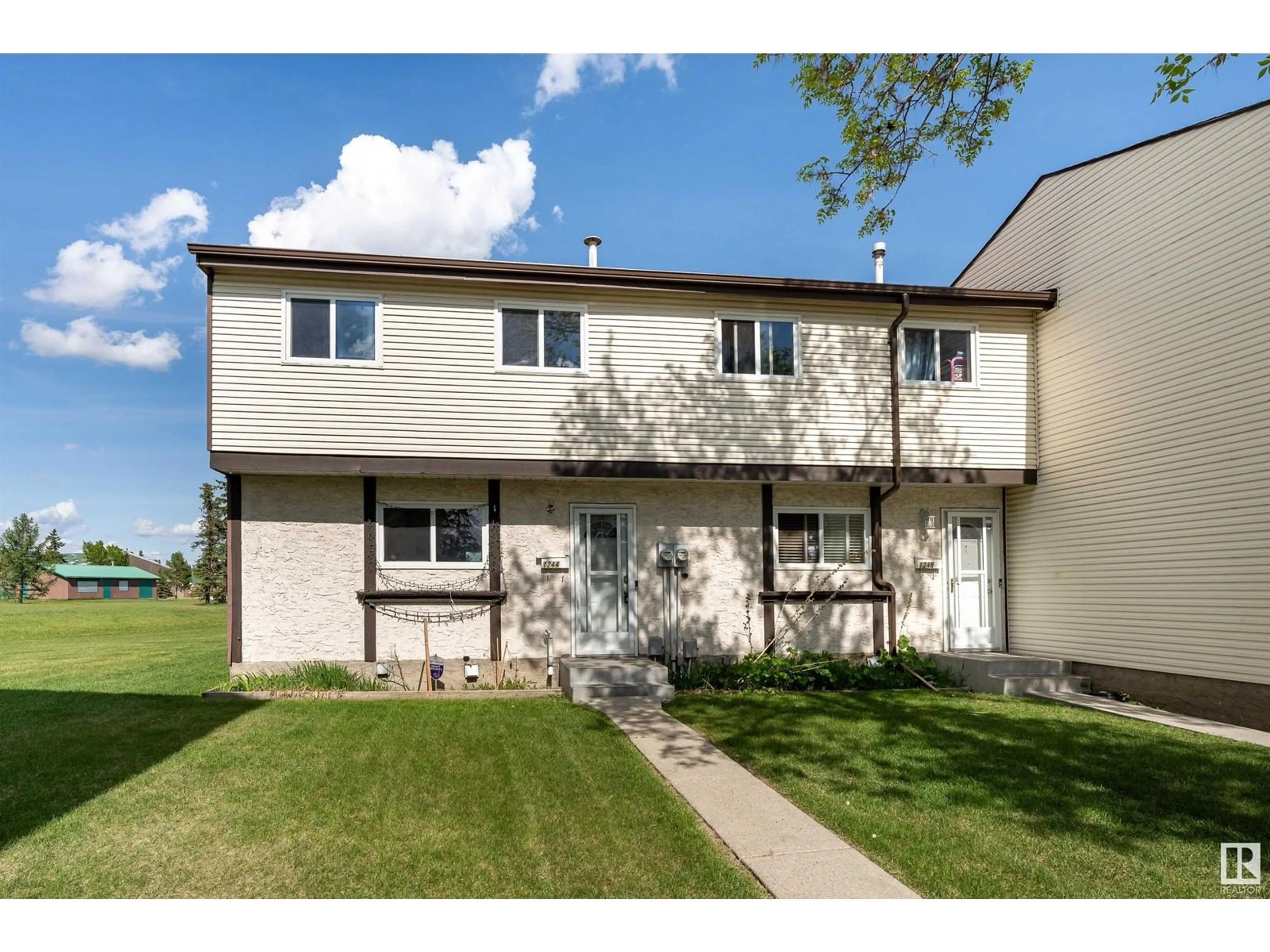 Home with vinyl exterior material, street for NW - 1244 LAKEWOOD W, Edmonton Alberta T6K3P2