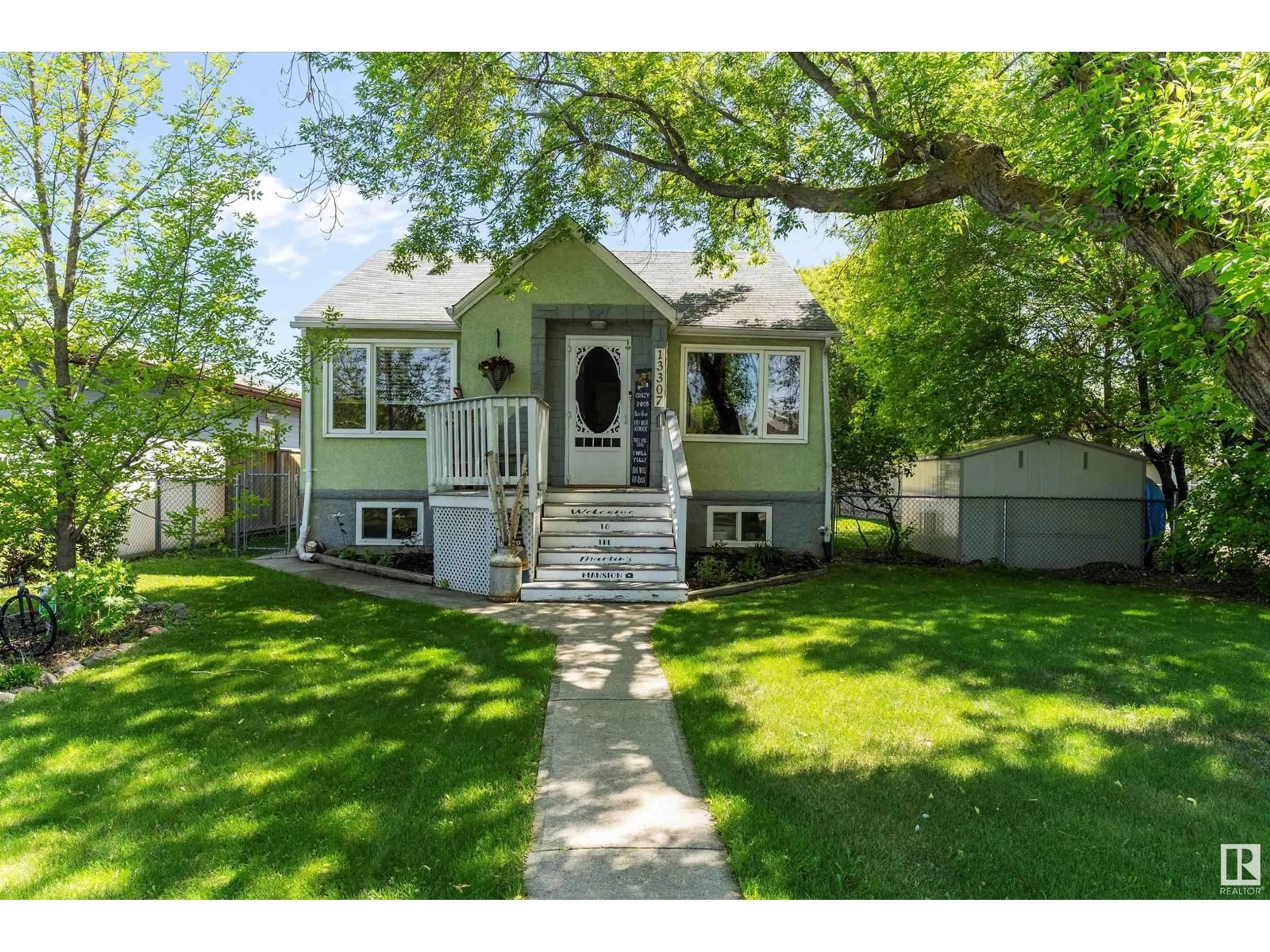 Home with vinyl exterior material, street for NW - 13307 117 ST, Edmonton Alberta T5E5K3
