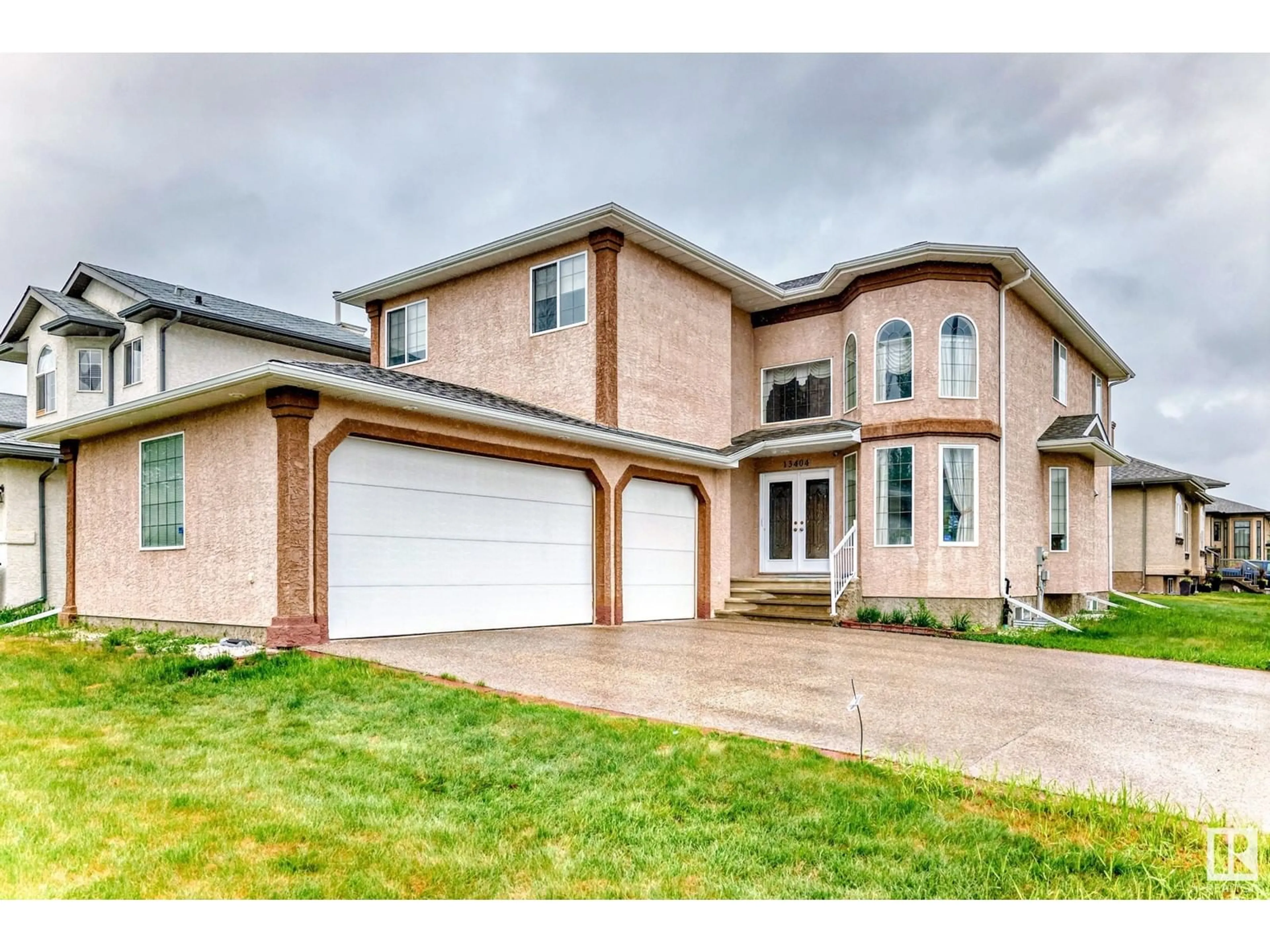 Home with brick exterior material, street for NW - 13404 160 AV, Edmonton Alberta T6V0B9