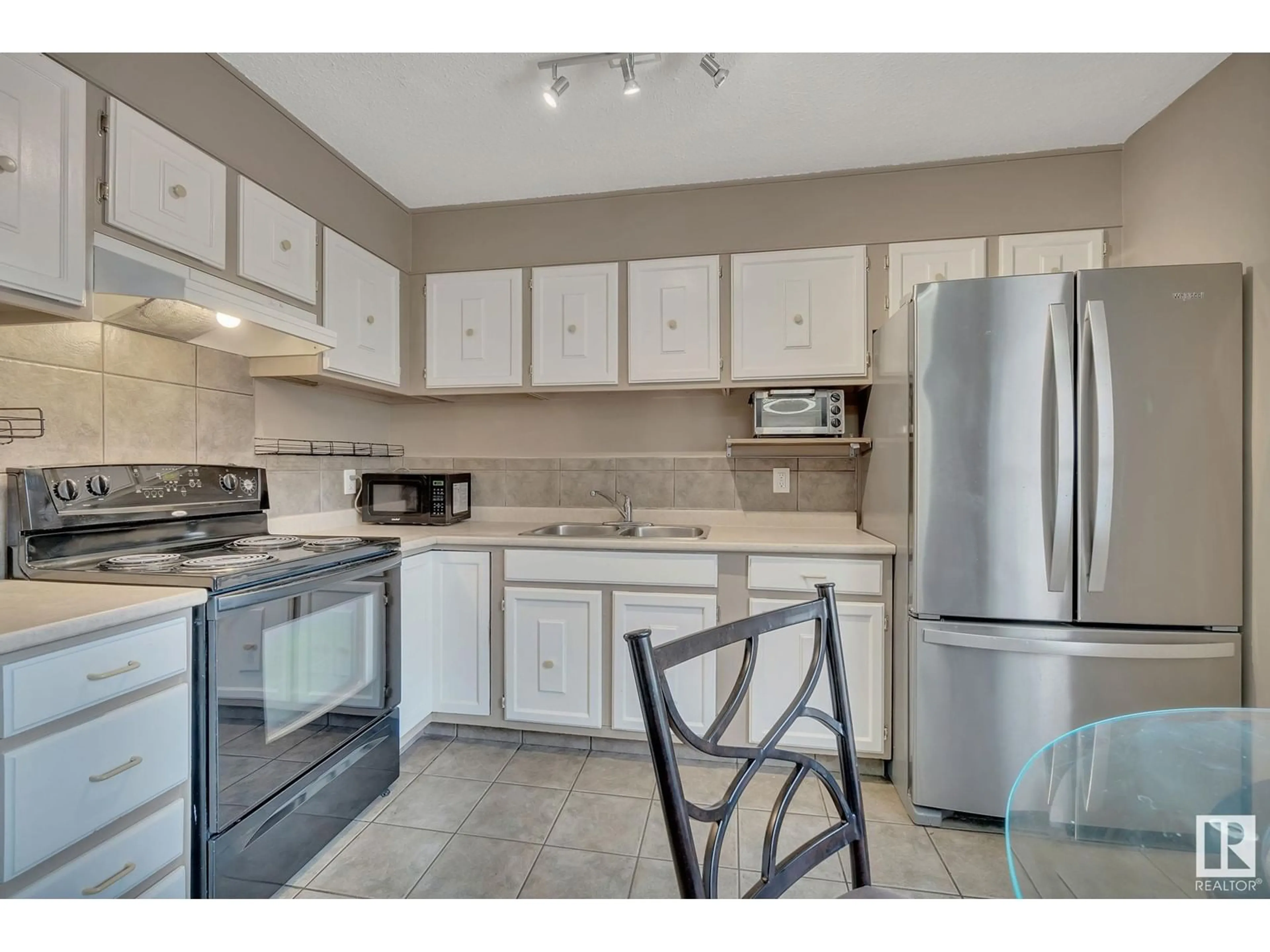 Standard kitchen, unknown for 499 KNOTTWOOD RD W, Edmonton Alberta T6K2V6