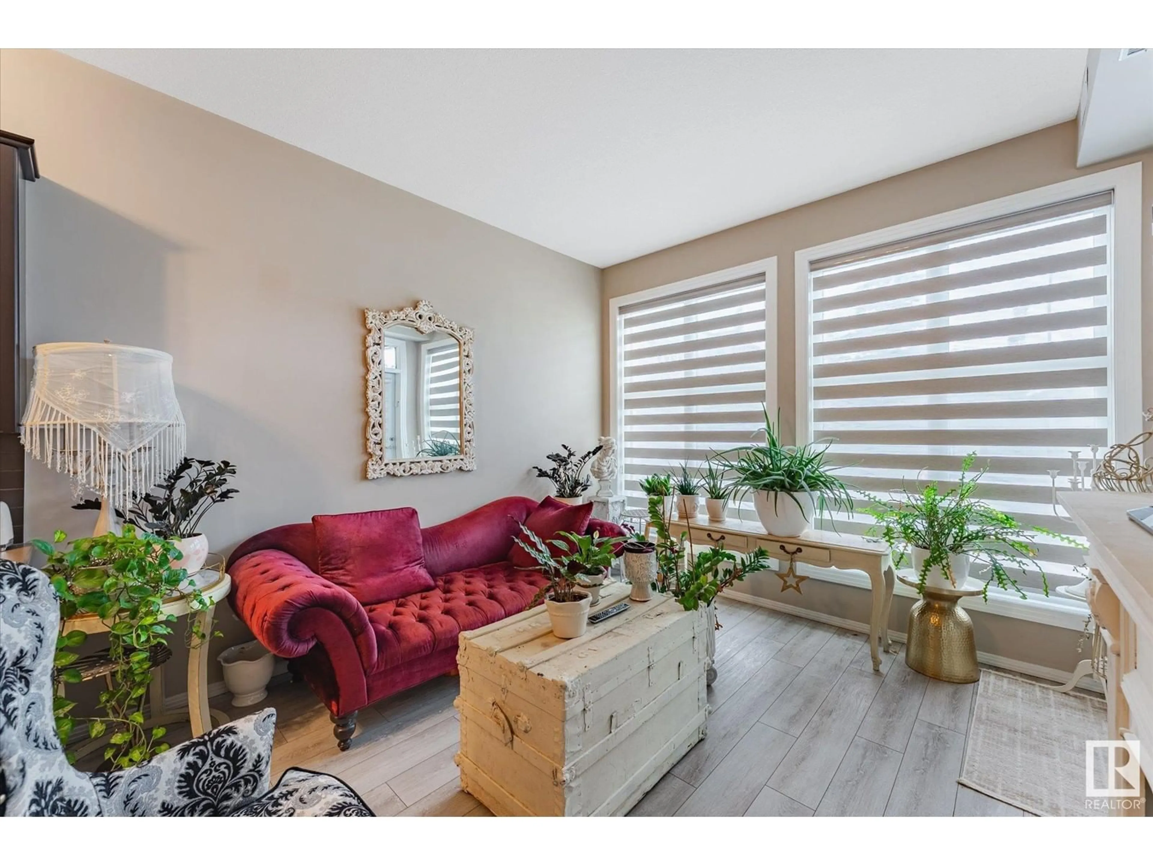 Living room with furniture, wood/laminate floor for #103 - 10531 117 ST, Edmonton Alberta T5H0A8