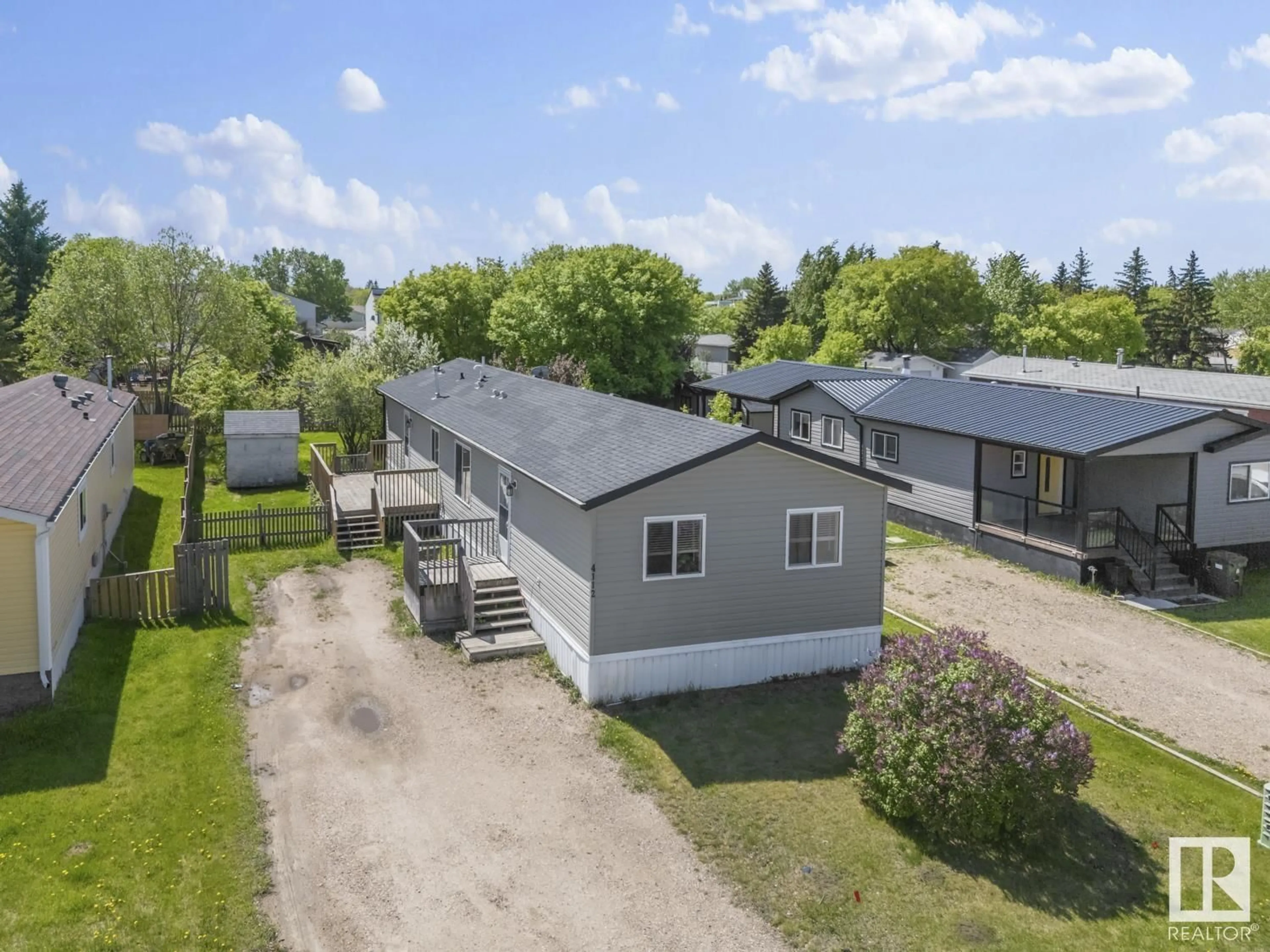 A pic from outside/outdoor area/front of a property/back of a property/a pic from drone, street for 4112 49 AV, Bonnyville Town Alberta T9N1G1