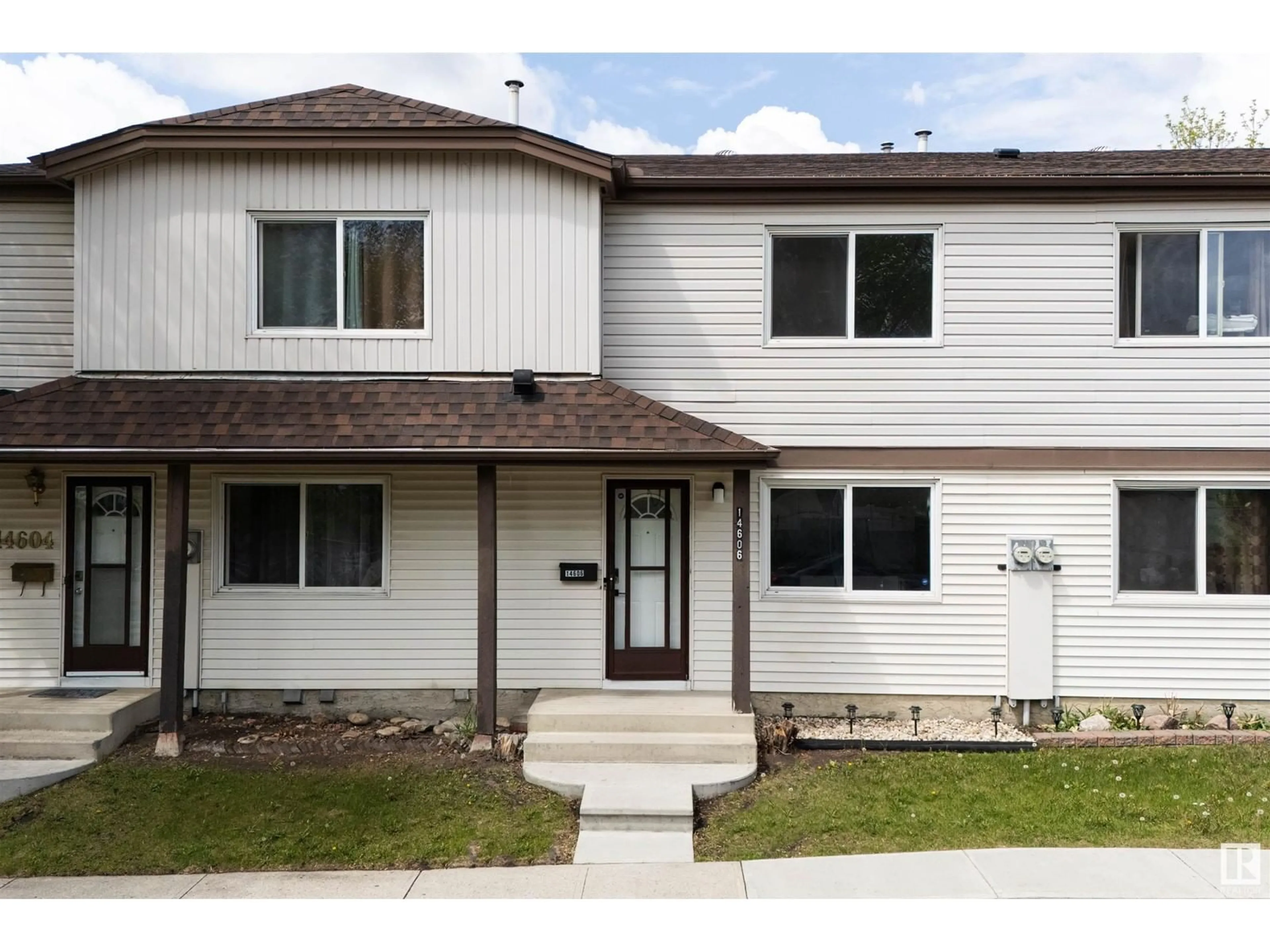 Home with vinyl exterior material, street for 14606 54 ST, Edmonton Alberta T5A4L5