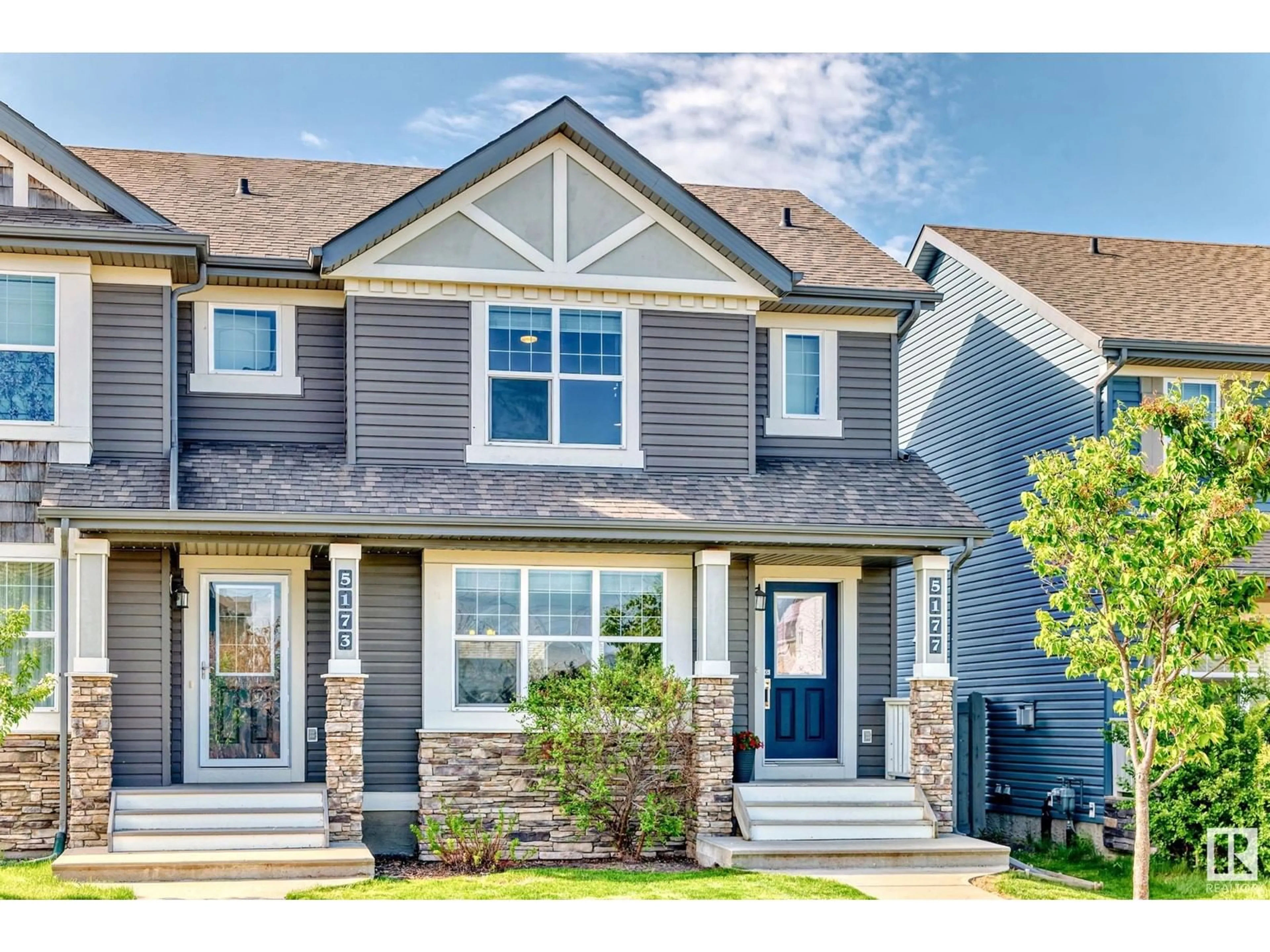 Home with vinyl exterior material, street for 5177 2A AV SW, Edmonton Alberta T6X0R3