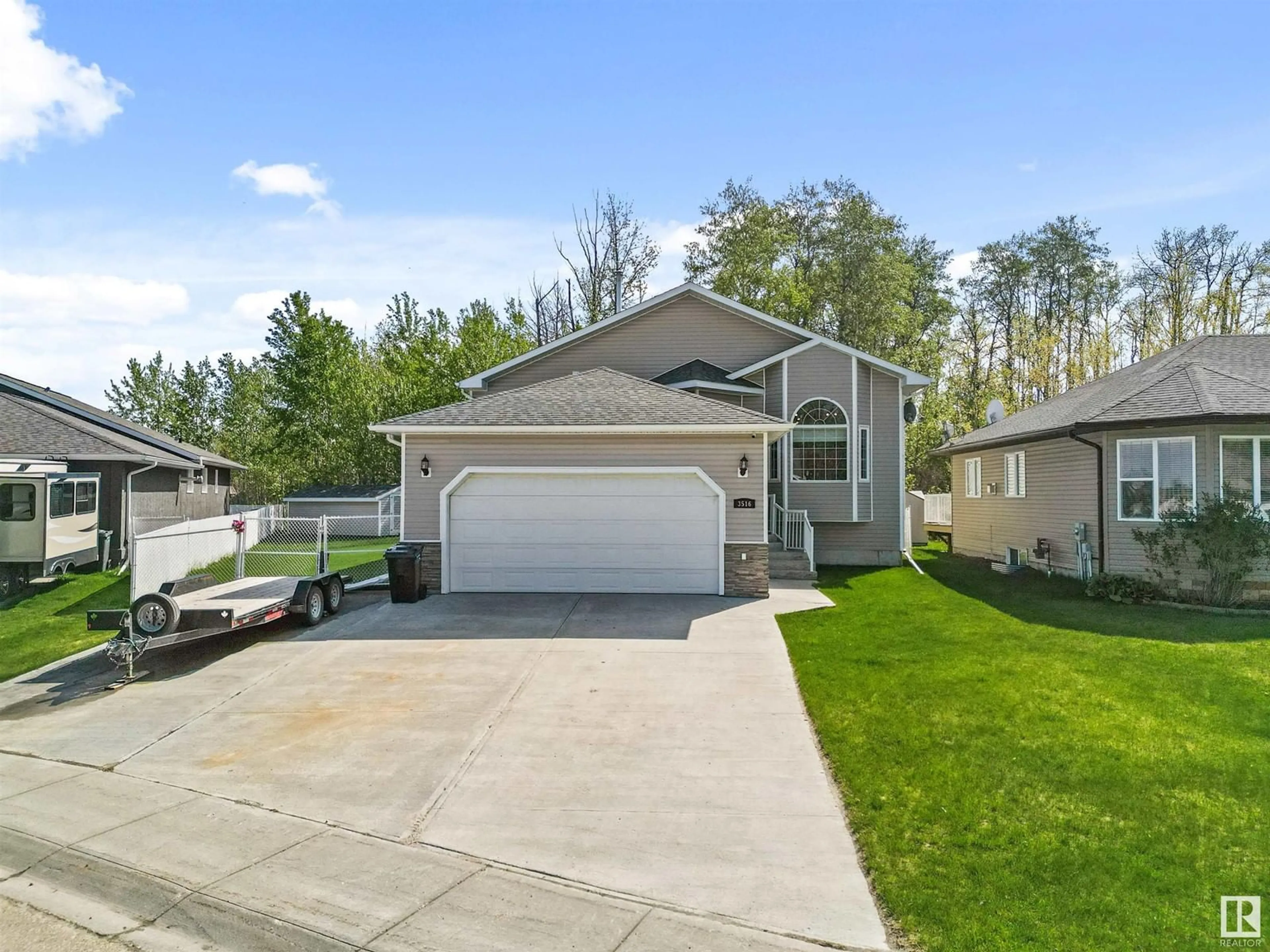 Home with vinyl exterior material, street for 3516 45 STREET, Drayton Valley Alberta T7A1W3
